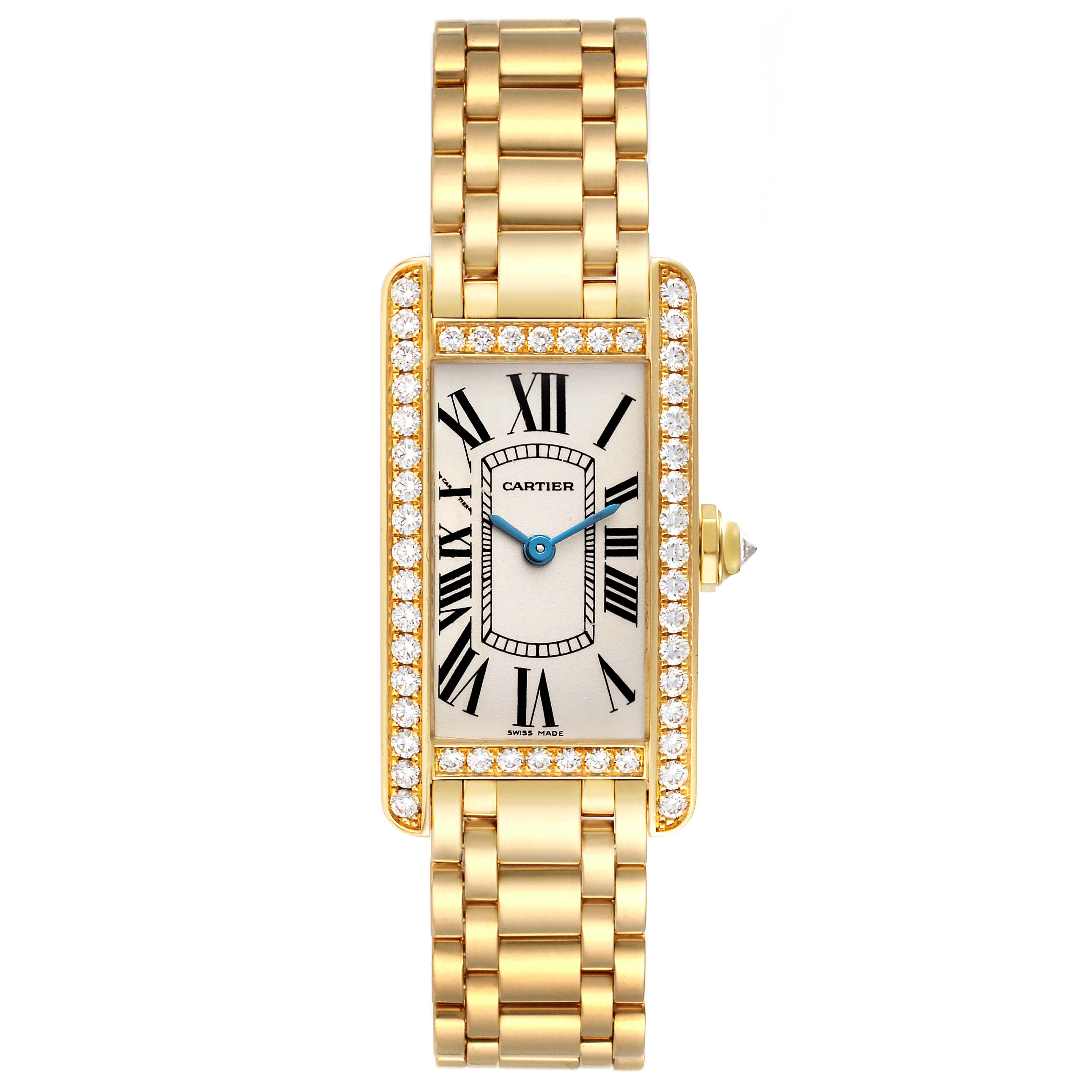 The image shows a Cartier Tank Americaine WB7072K2 Women's Yellow Gold Silver Dial WB7072K2 Women's Yellow Gold Silver Dial watch from a front angle, displaying its gold case, diamond bezel, and bracelet.