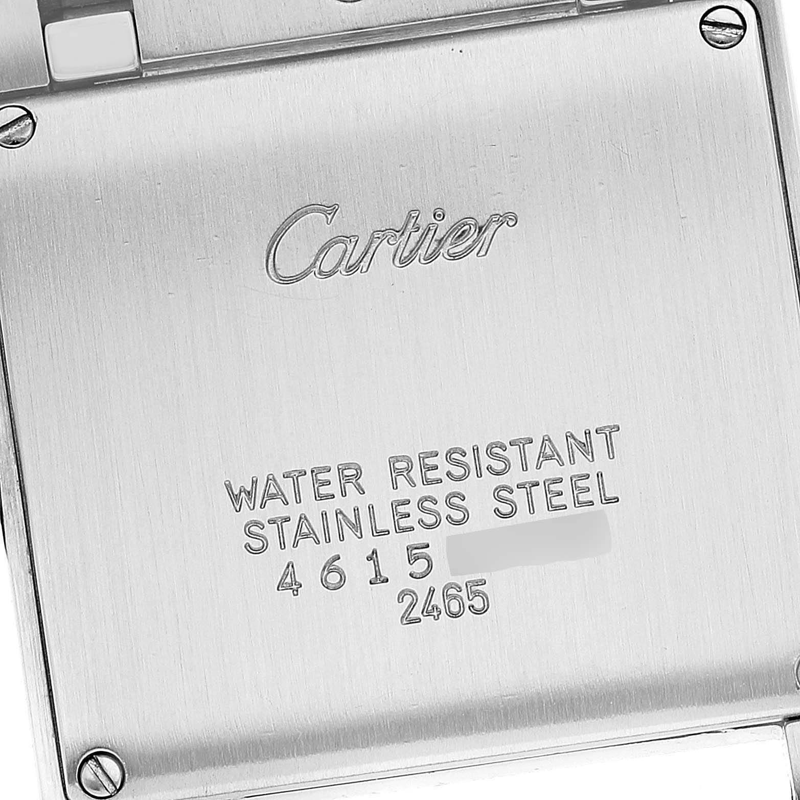 This is a close-up shot of the stainless steel back of a Cartier Tank Francaise W51012Q4 Women's Steel and Gold (two tone) Silver Dial W51012Q4 Women's Steel and Gold (two tone) Silver Dial watch, showing water resistance and model information.