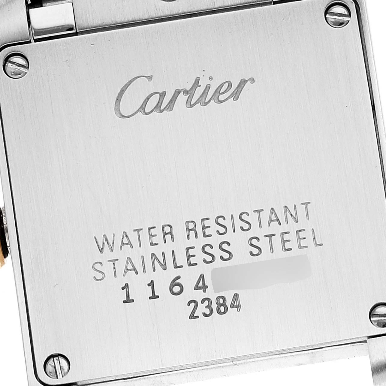 This is the back view of a Tank Francaise Cartier watch, showing the brand name and water resistance details.