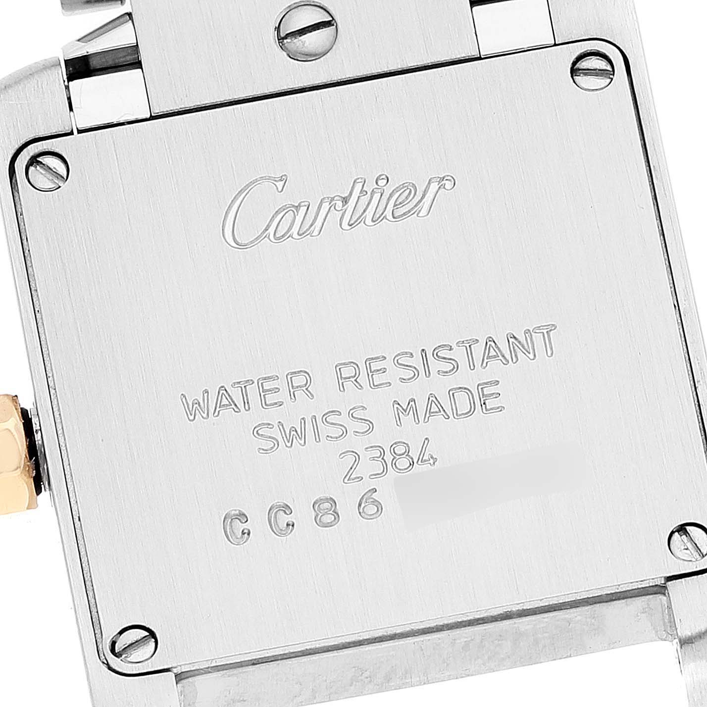 The image shows the back case of a Cartier Tank Francaise W51007Q4 Women's Steel and Gold (two tone) Silver Dial W51007Q4 Women's Steel and Gold (two tone) Silver Dial watch, displaying the brand name, "WATER RESISTANT," and "SWISS MADE" labels.