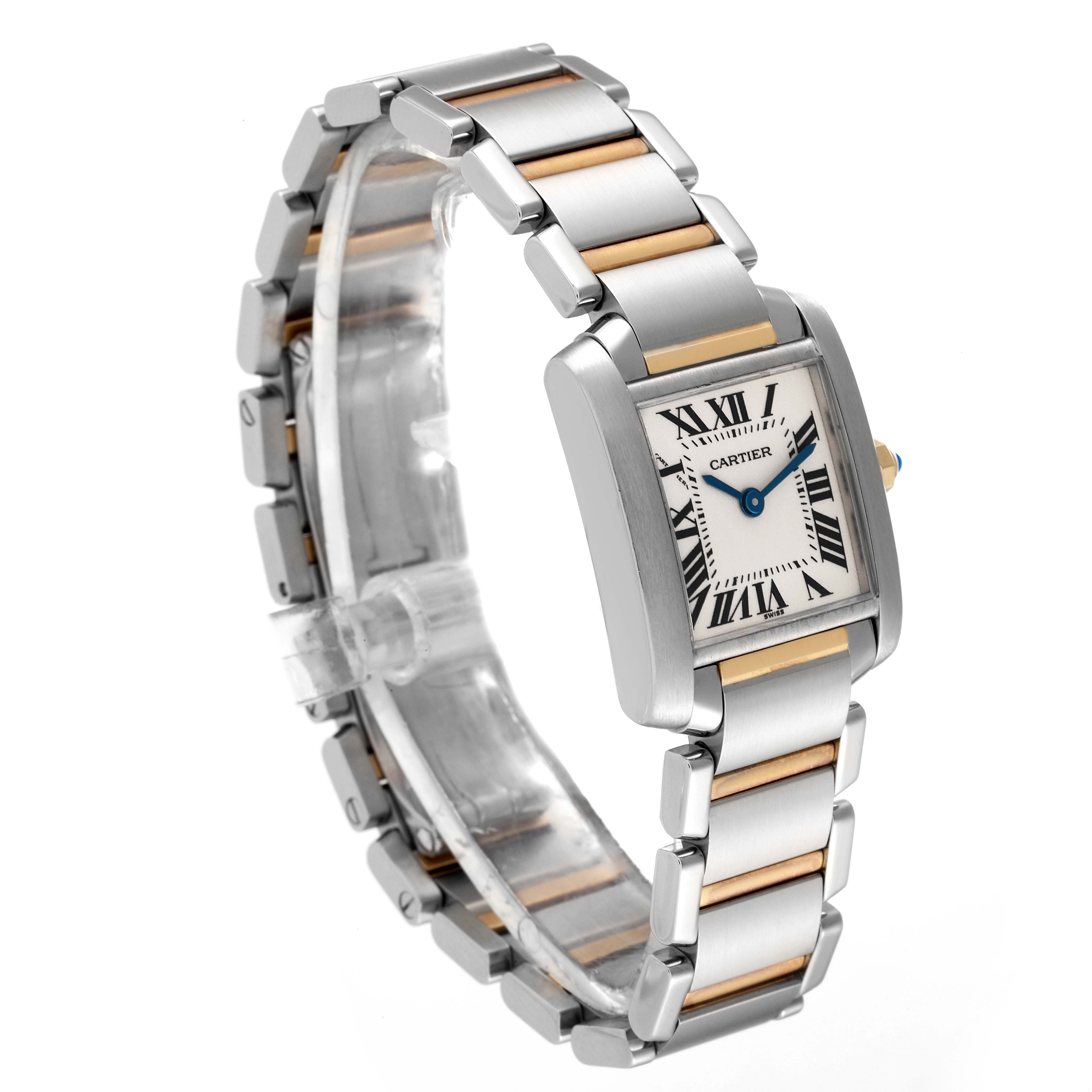 The image shows a side angle of a Cartier Tank Française watch, highlighting its two-tone link bracelet and rectangular face with Roman numerals.