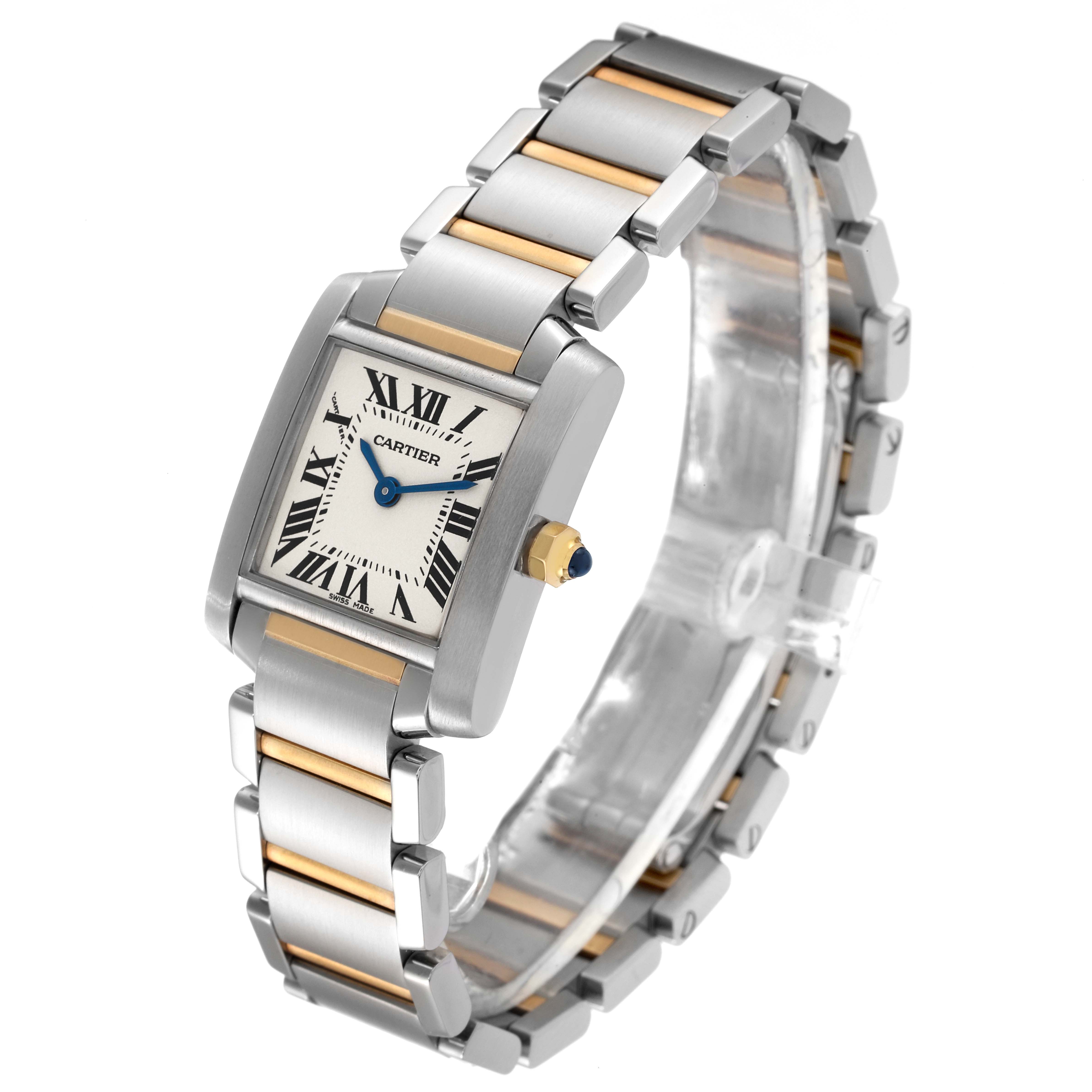 The image shows a Cartier Tank Francaise W51007Q4 Women's Steel and Gold (two tone) Silver Dial W51007Q4 Women's Steel and Gold (two tone) Silver Dial watch at an angle, highlighting its face, bracelet, and crown.