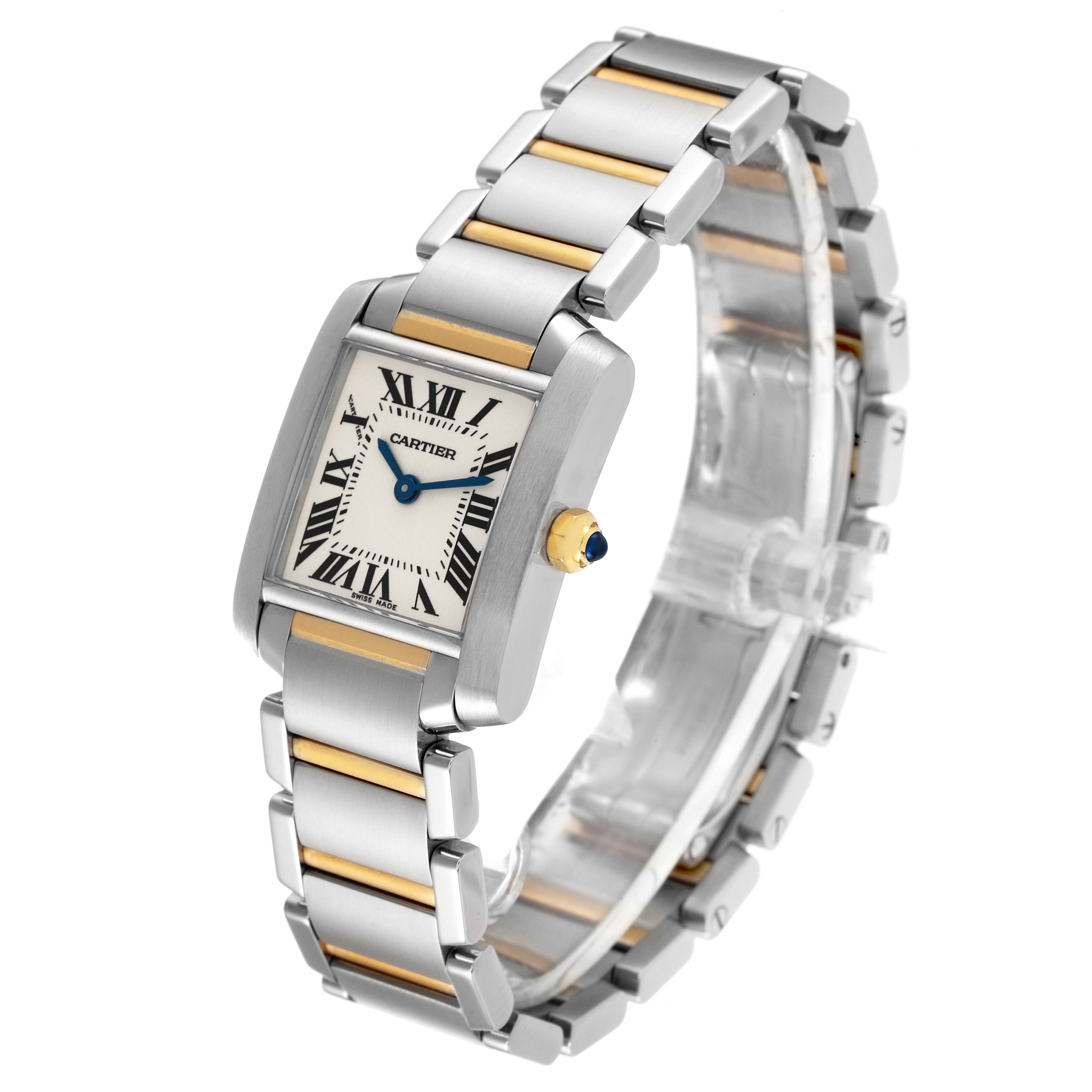 The image shows an angled view of a Cartier Tank Francaise W51007Q4 Women's Steel and Gold (two tone) Silver Dial W51007Q4 Women's Steel and Gold (two tone) Silver Dial watch, highlighting its face, bracelet, and crown with a blue gemstone.