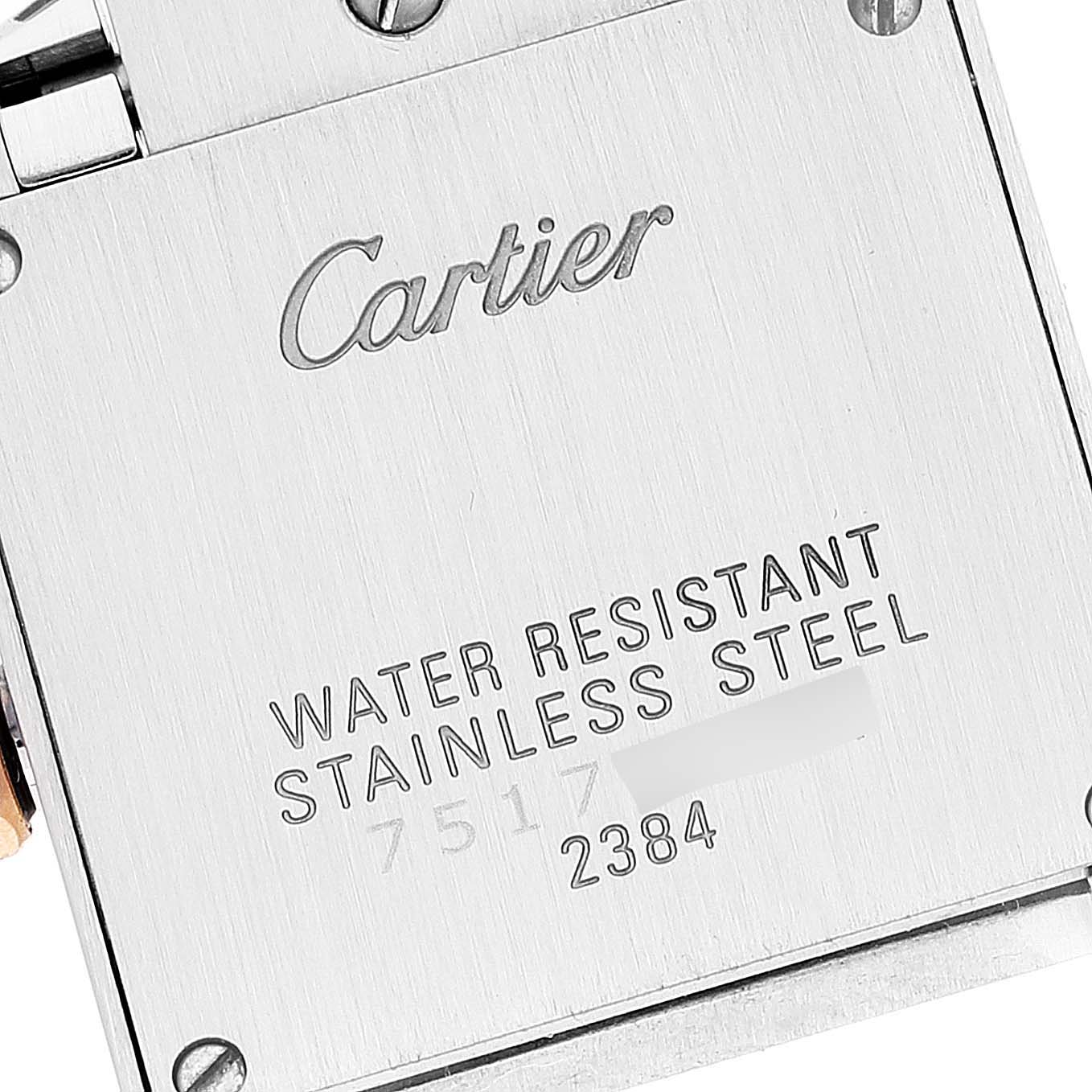 This image shows the back case of a Cartier Tank Francaise W51027Q4 Women's Steel and Gold (two tone) Mother of Pearl Dial W51027Q4 Women's Steel and Gold (two tone) Mother of Pearl Dial watch, highlighting the brand name and material details.