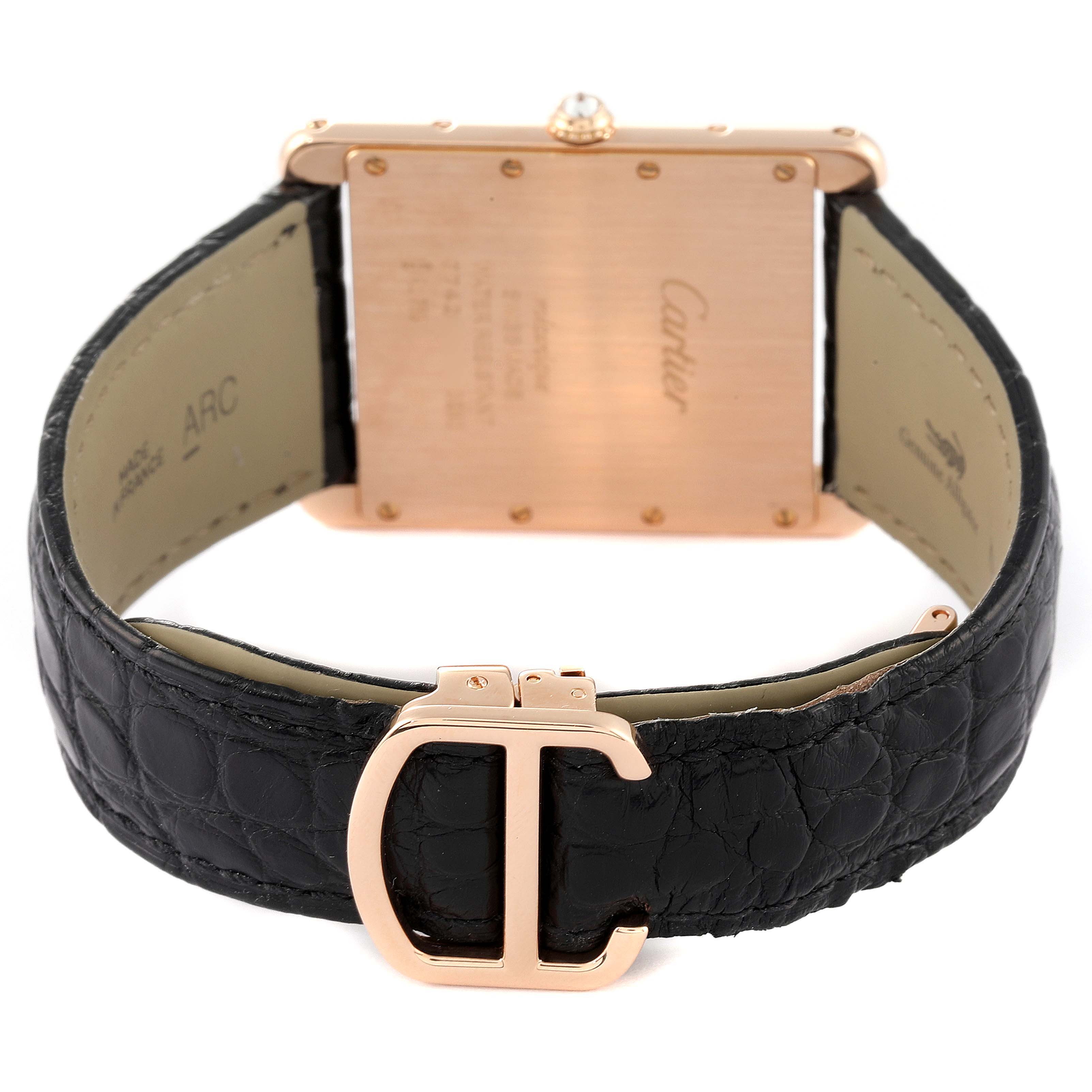The image shows the back of the Cartier Tank Louis WT200005 Men's Rose Gold Silver Dial WT200005 Men's Rose Gold Silver Dial watch, highlighting the case back and black leather strap with a distinctive "C" clasp.