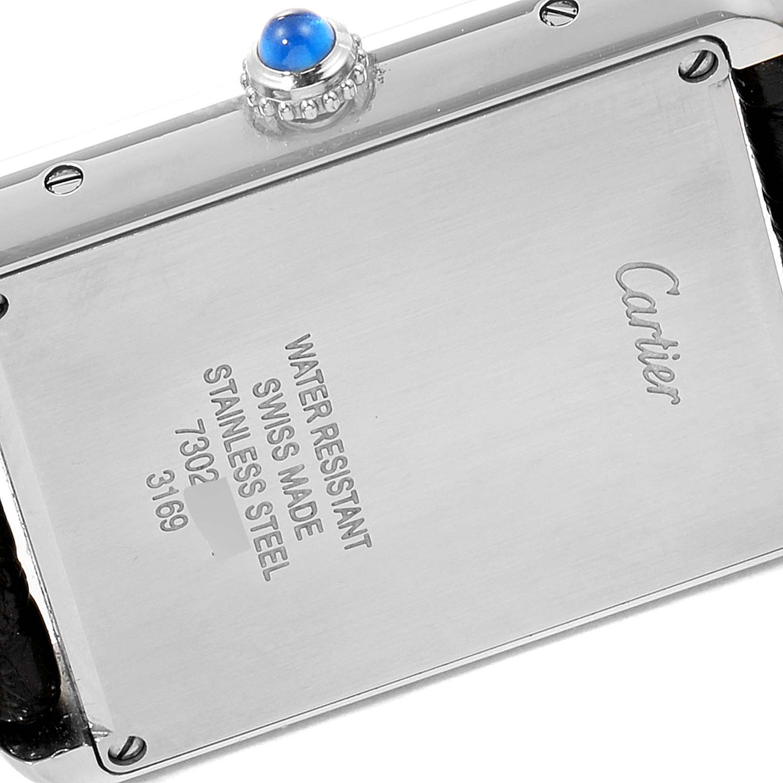 This image shows the back case of a Cartier Tank Solo W1018355 Men's Stainless Steel Silver Dial W1018355 Men's Stainless Steel Silver Dial watch, engraved with model information and featuring a blue cabochon crown.