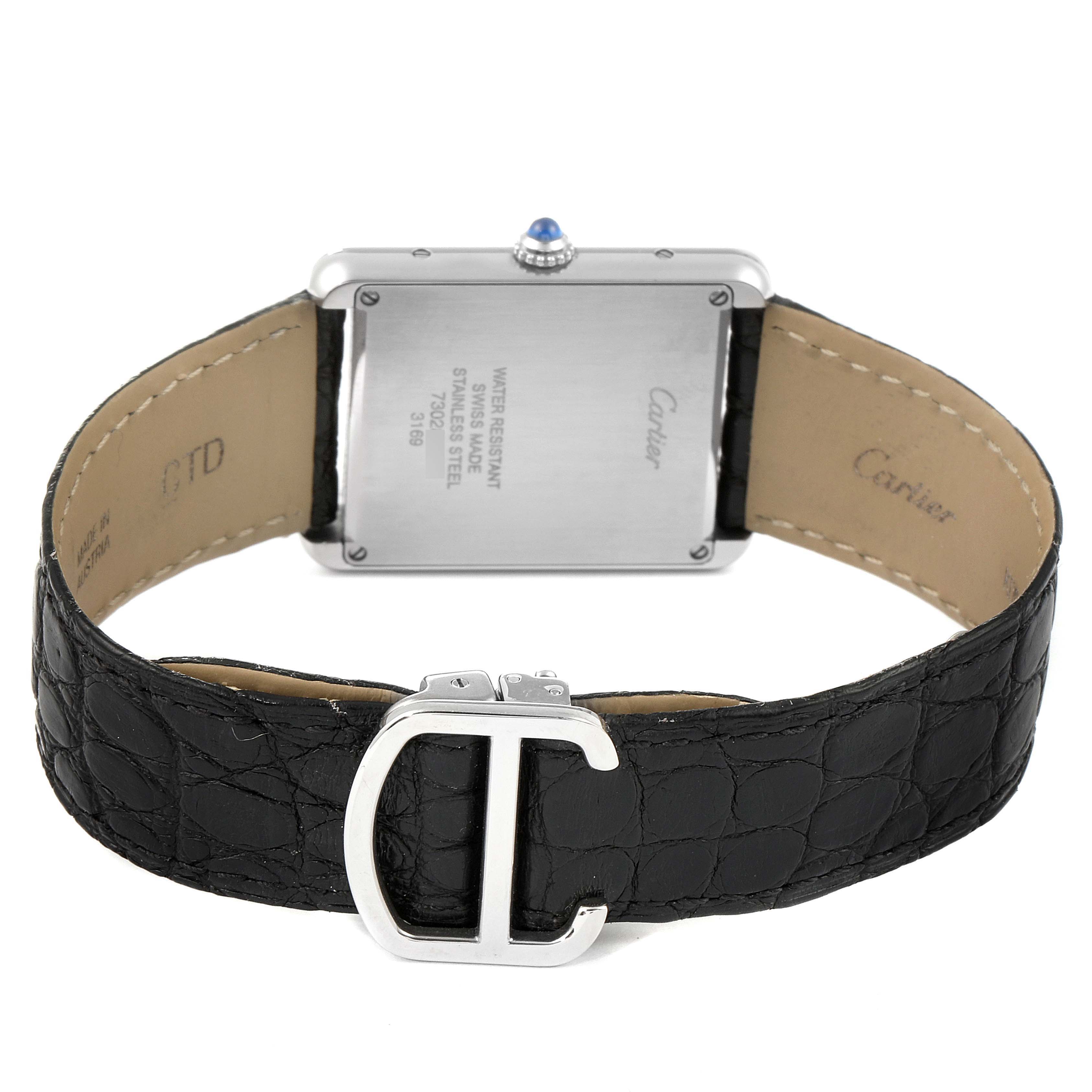 The image shows the back view of a Cartier Tank Solo W1018355 Men's Stainless Steel Silver Dial W1018355 Men's Stainless Steel Silver Dial watch, highlighting the case back and leather strap with a close-up of the clasp.