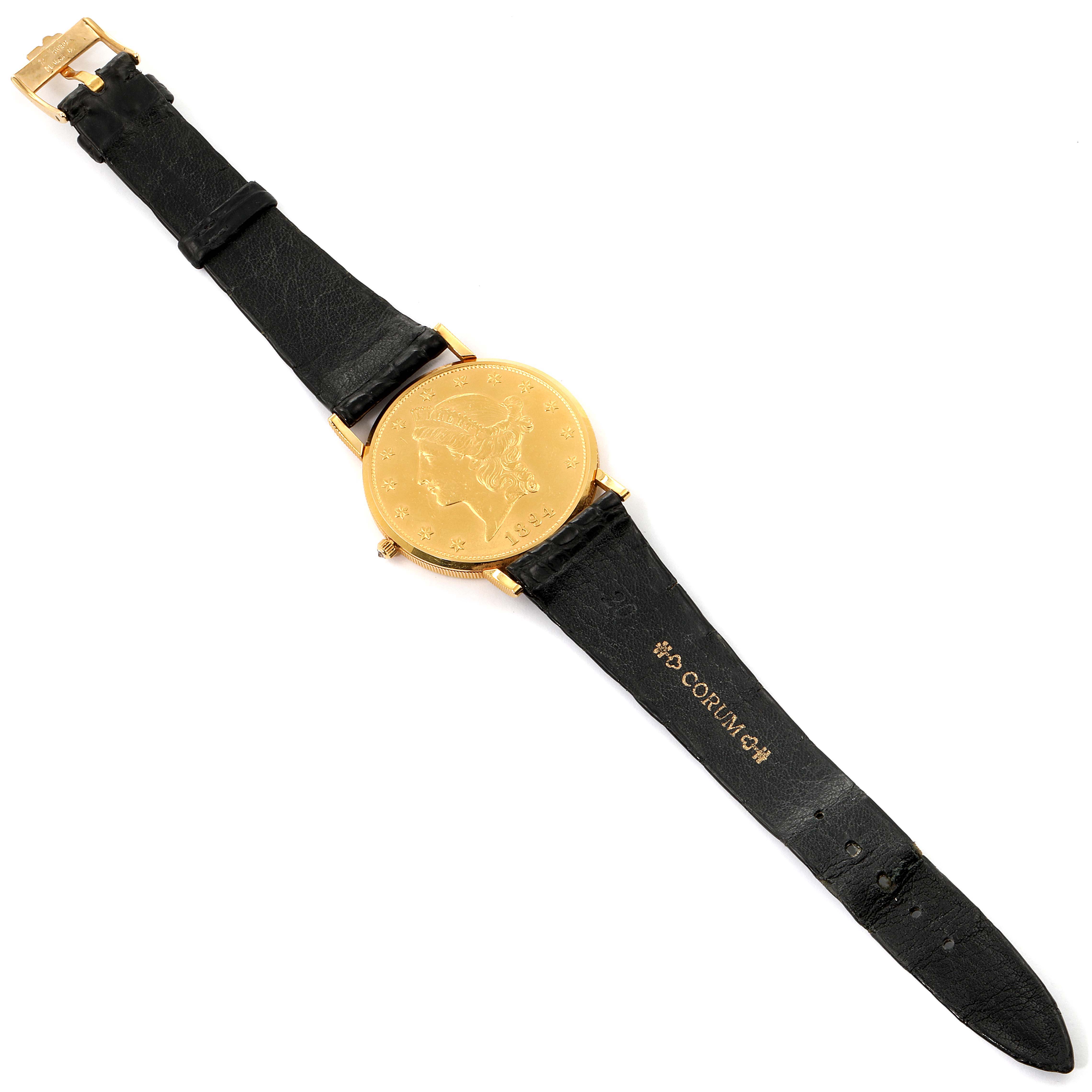 The Corum Coin Watch  Men's Yellow Gold Black Dial  Men's Yellow Gold Black Dial model is shown from a top-down angle, showcasing its face, black leather strap, and gold-tone buckle.
