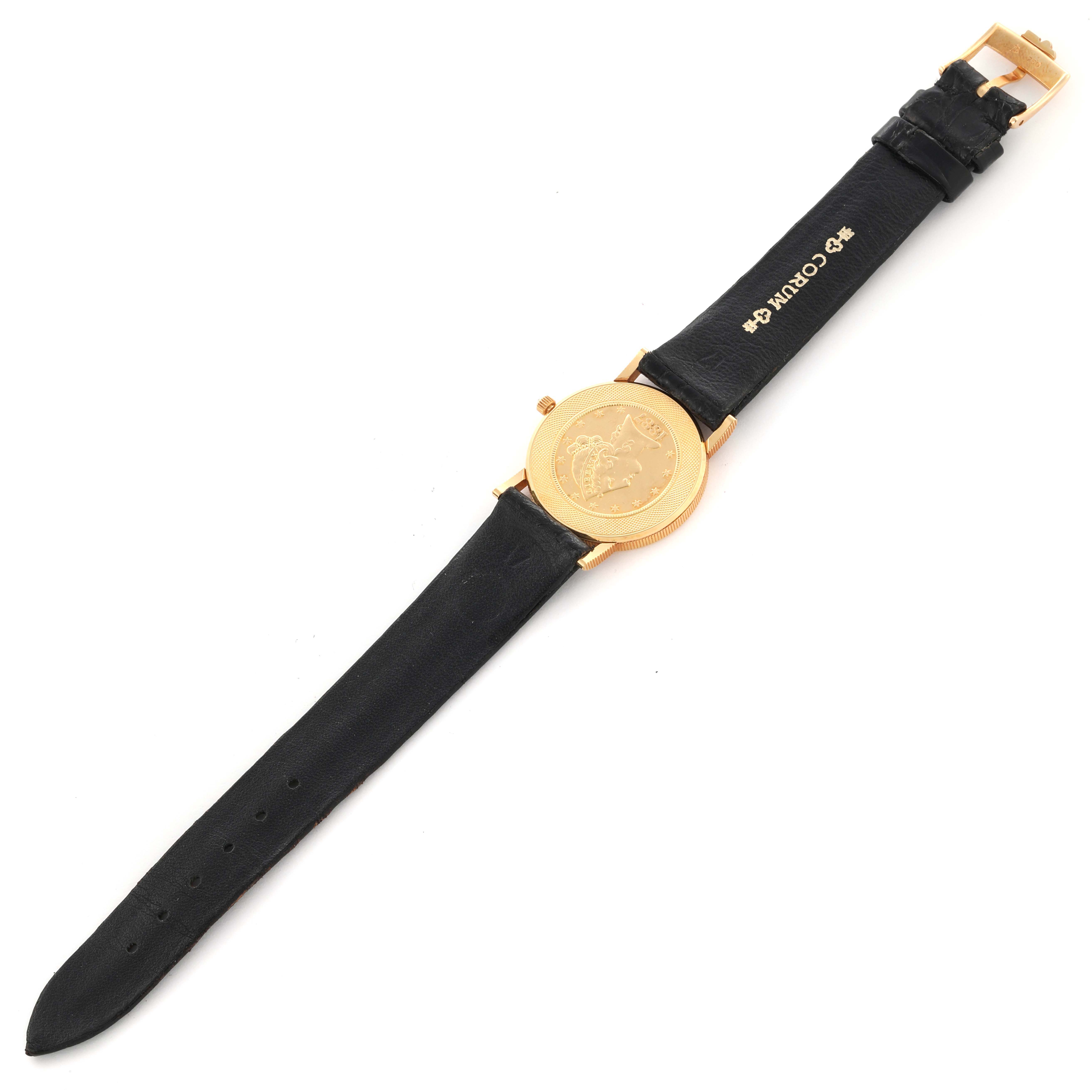 The Corum 1887 Women's Yellow Gold Champagne Dial 1887 Women's Yellow Gold Champagne Dial Yellow Gold 5 Dollars Coin Diamond Ladies Watch is shown from a top view, displaying the coin face and black leather strap.