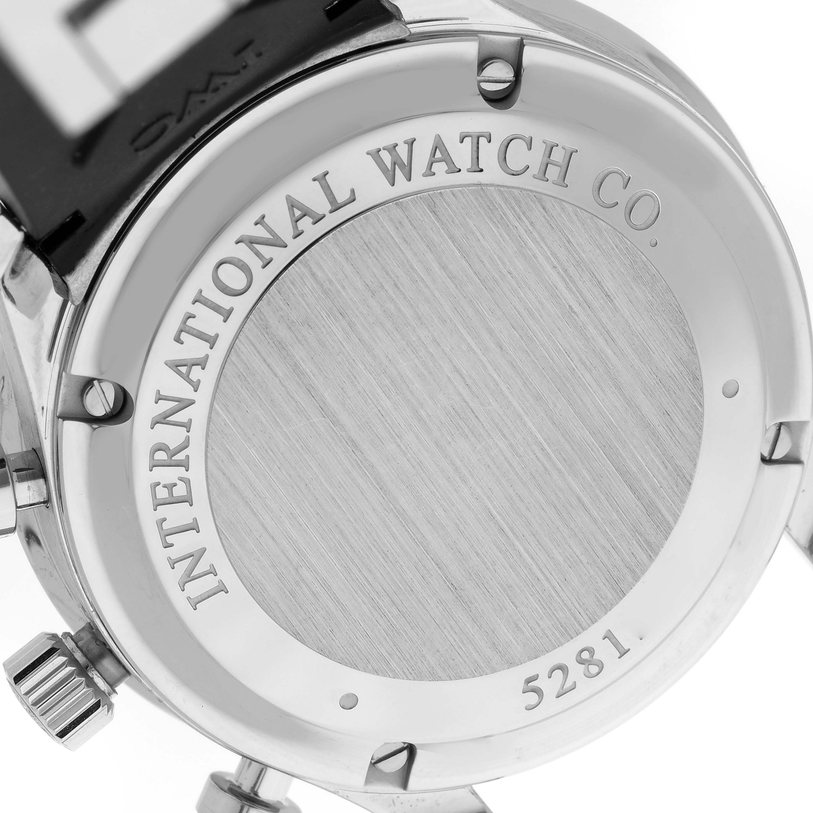 The image shows the back case of an IWC Portuguese IW371438 Men's Stainless Steel Black Dial IW371438 Men's Stainless Steel Black Dial model watch, highlighting the "International Watch Co." engraving.