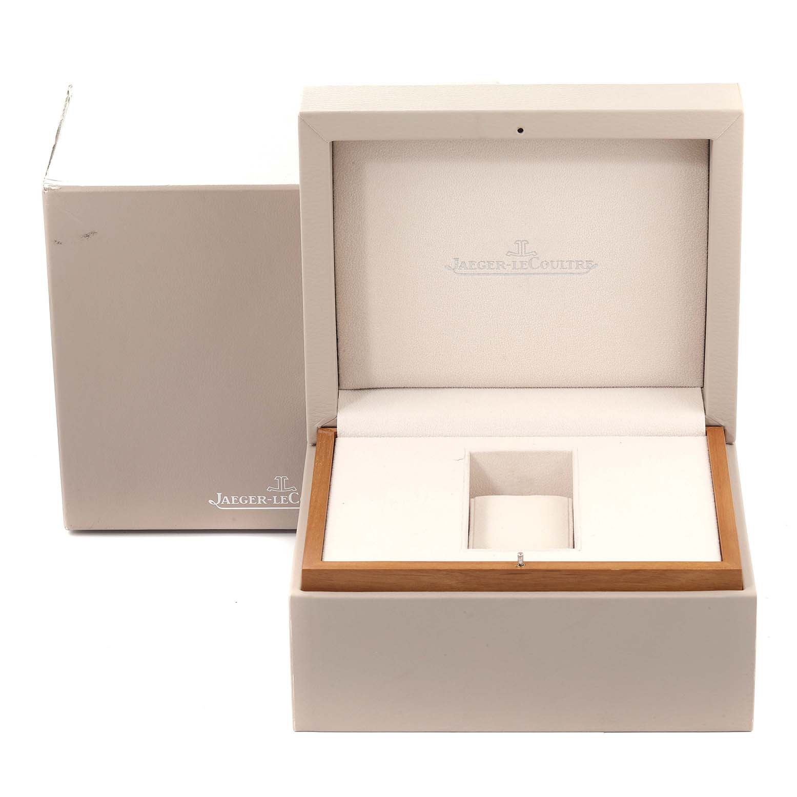 This image shows the opened presentation box for a Jaeger-LeCoultre Reverso model watch, revealing a padded interior compartment.