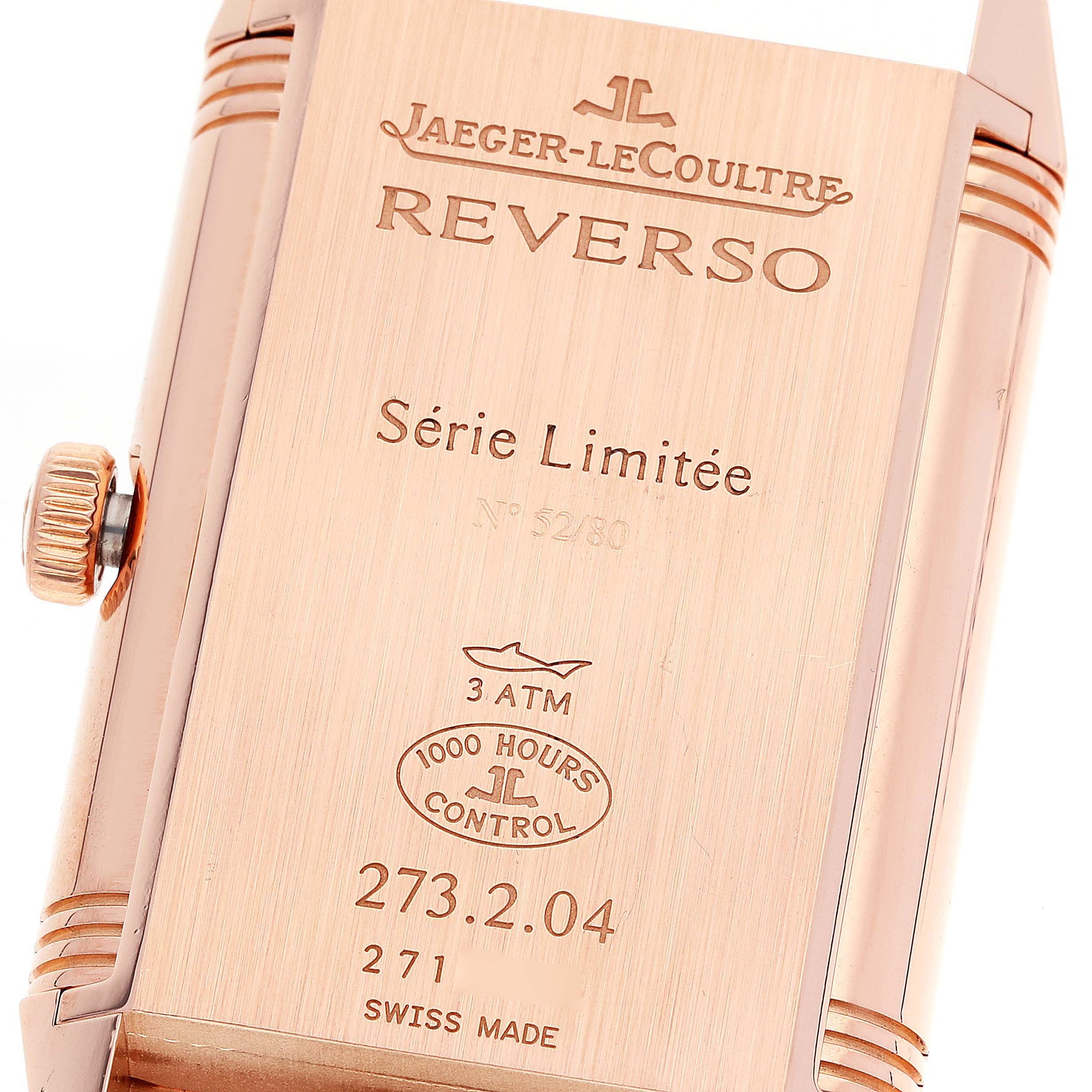 The image shows the back case and crown of the Jaeger-LeCoultre Reverso watch.