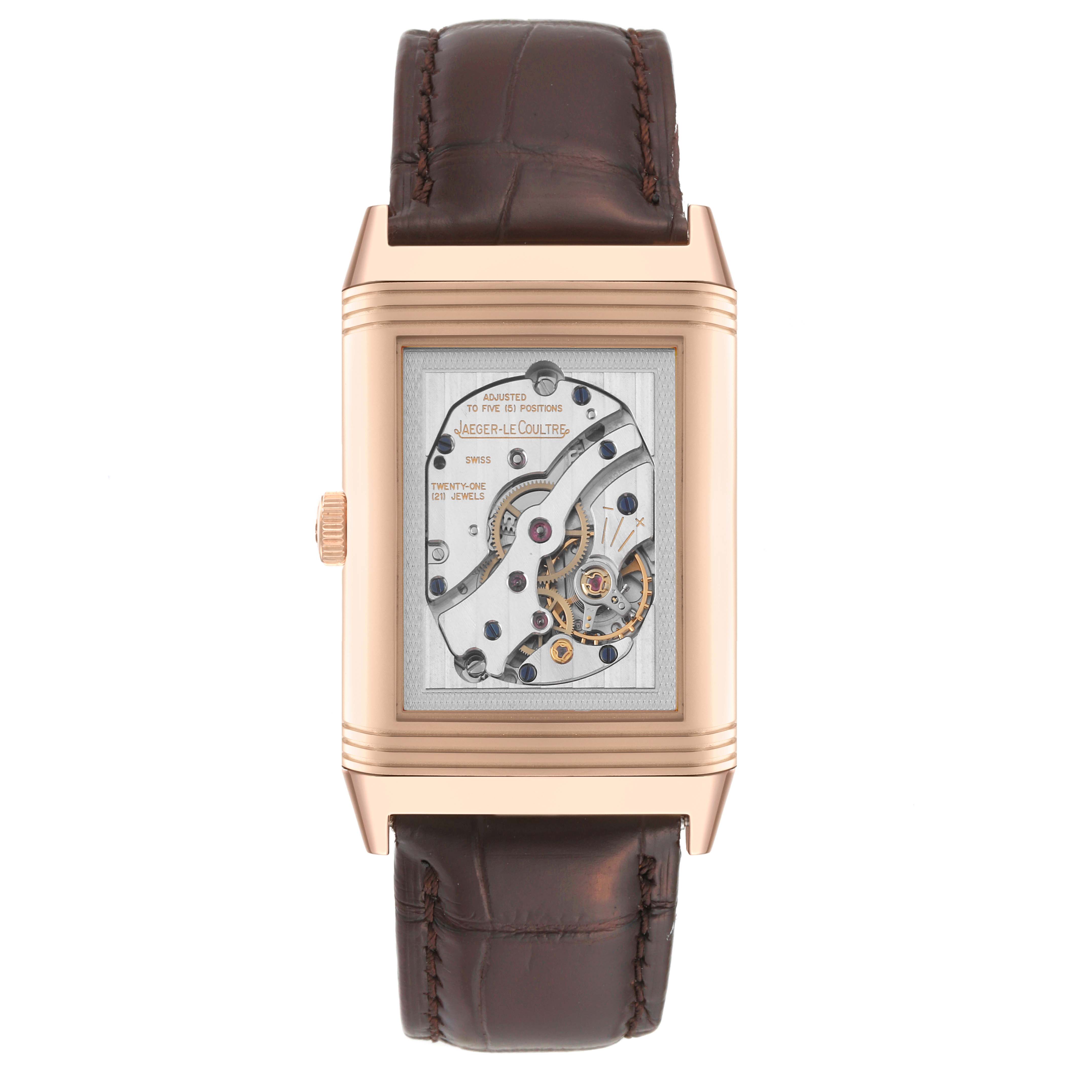 The image shows the back view of a Jaeger LeCoultre Reverso Q3752520 Men's Rose Gold Silver Dial Q3752520 Men's Rose Gold Silver Dial watch, highlighting its internal mechanism and leather strap.
