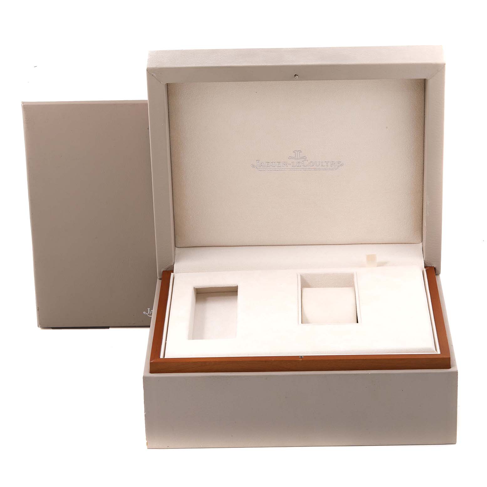 This image shows an open Jaeger LeCoultre Reverso Q3752520 Men's Rose Gold Silver Dial Q3752520 Men's Rose Gold Silver Dial watch box with compartments for the watch and accessories, viewed from the front.