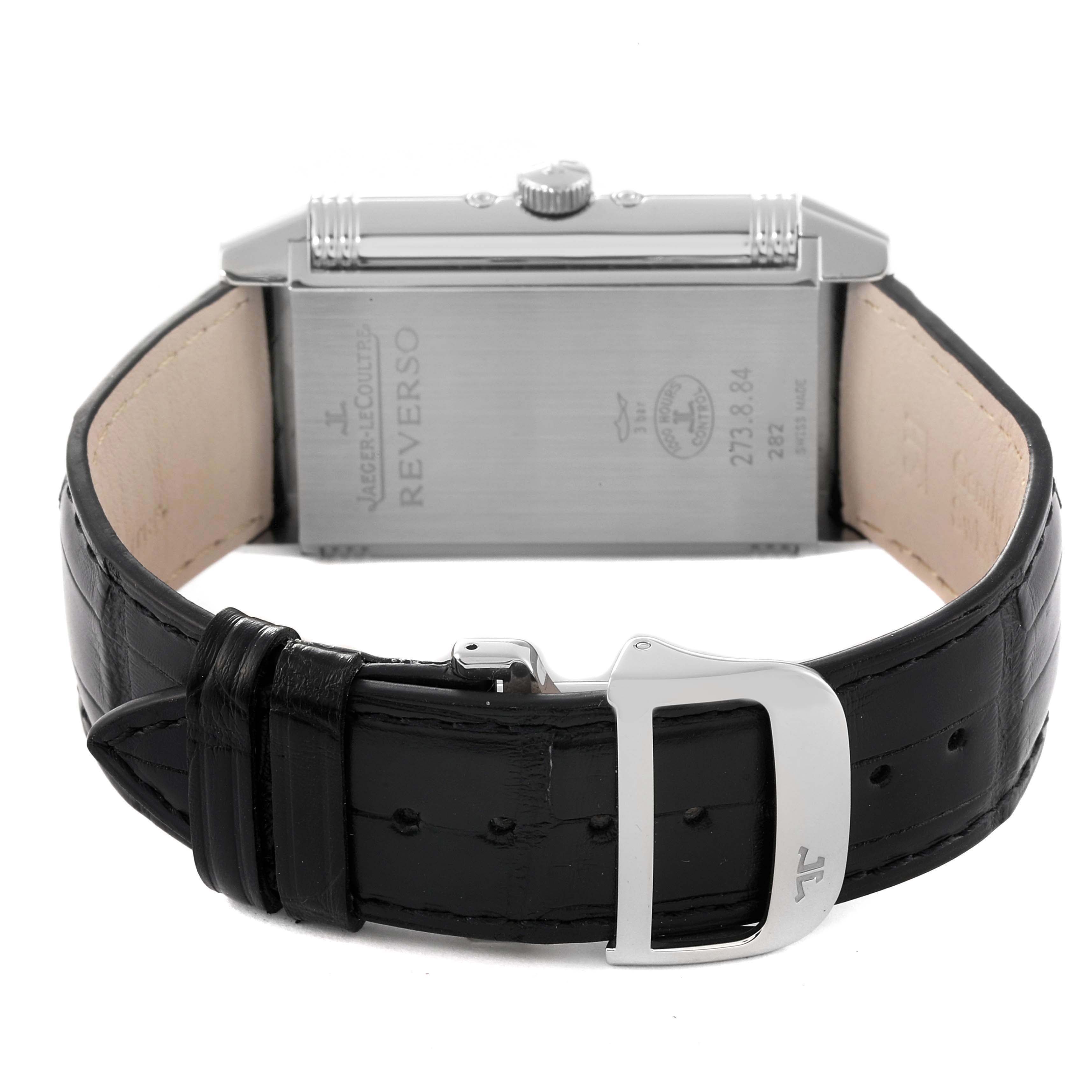 This image shows the backside and clasp of a Jaeger-LeCoultre Reverso watch at an angle.