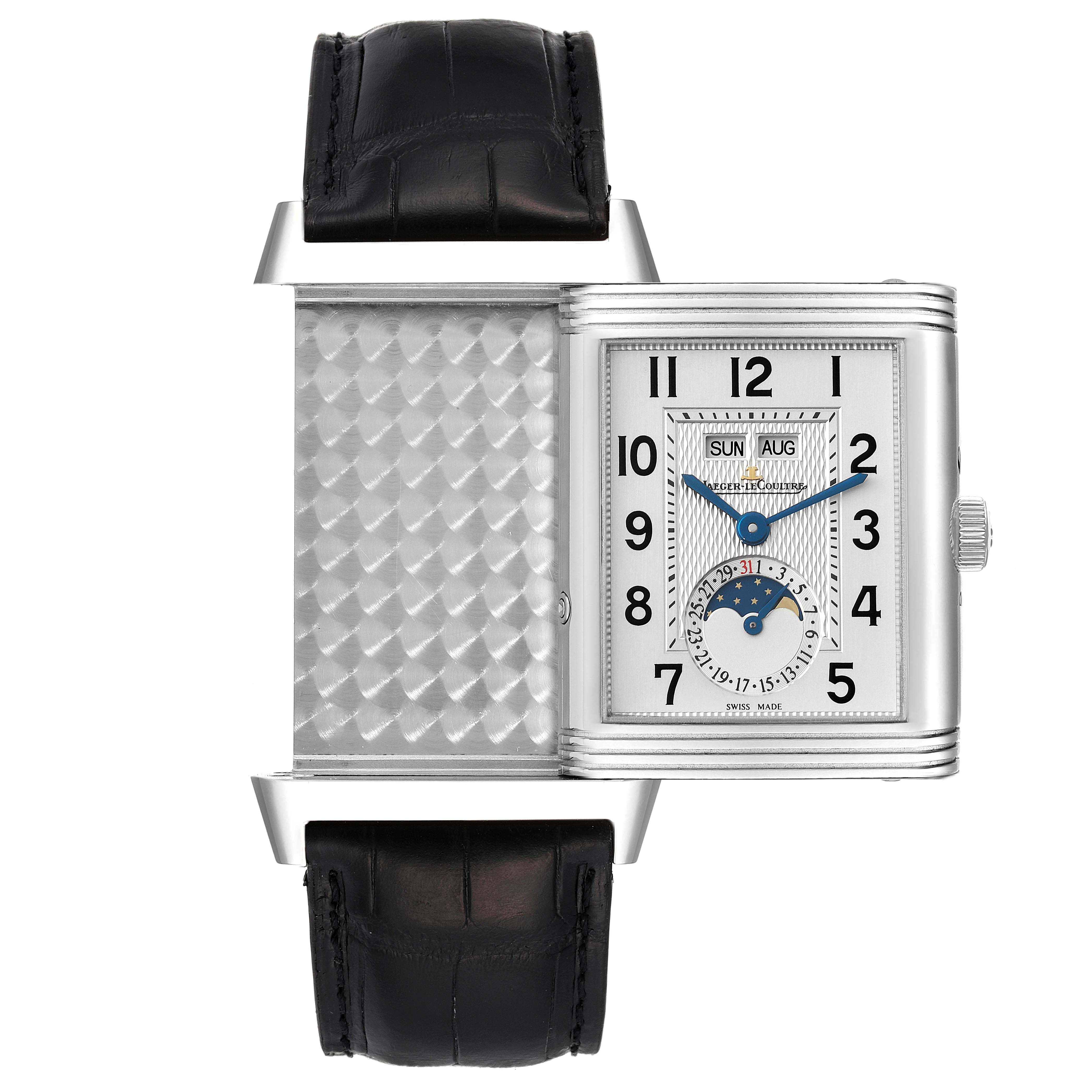 The image shows a Jaeger-LeCoultre Reverso watch, showcasing its swivel case and detailed front dial alongside a textured back panel.