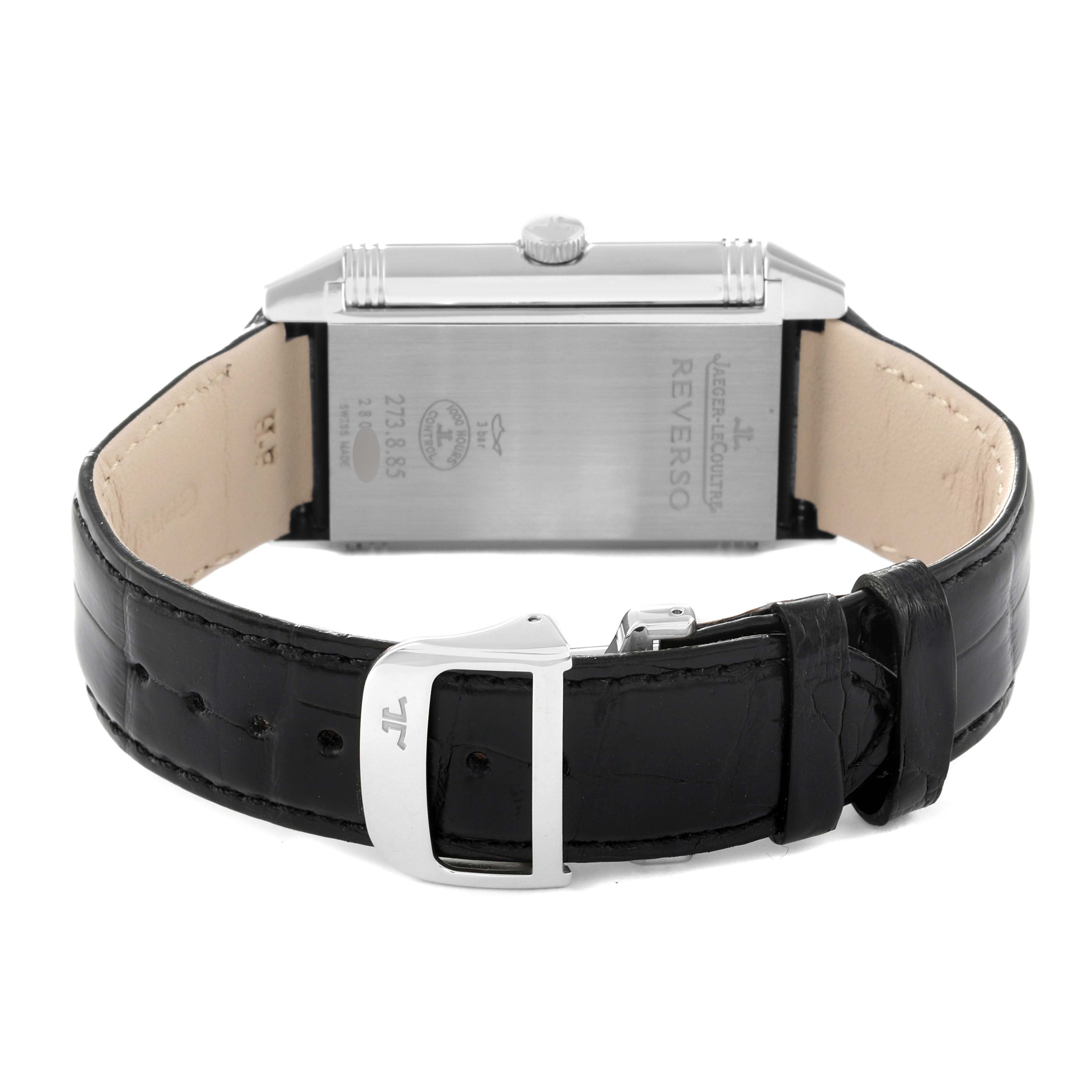 The image shows the back view of the Jaeger LeCoultre Reverso Q3748421 Men
s Stainless Steel Silver Dial Q3748421 Men
s Stainless Steel Silver Dial watch with its strap and buckle visible.