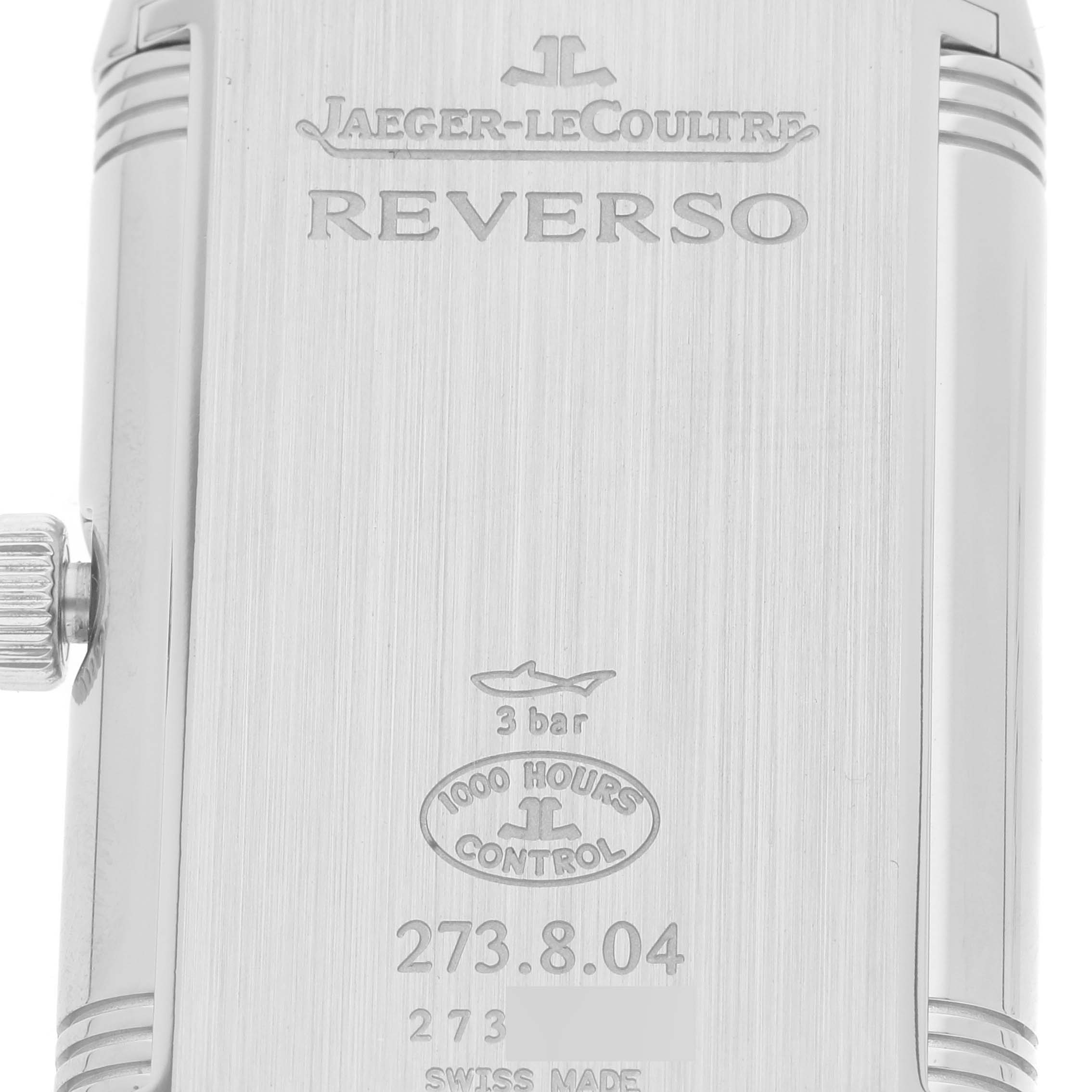The image shows the back of a Jaeger LeCoultre Reverso Q3748421 Men
s Stainless Steel Silver Dial Q3748421 Men
s Stainless Steel Silver Dial watch, including its branding, model, and certification details.