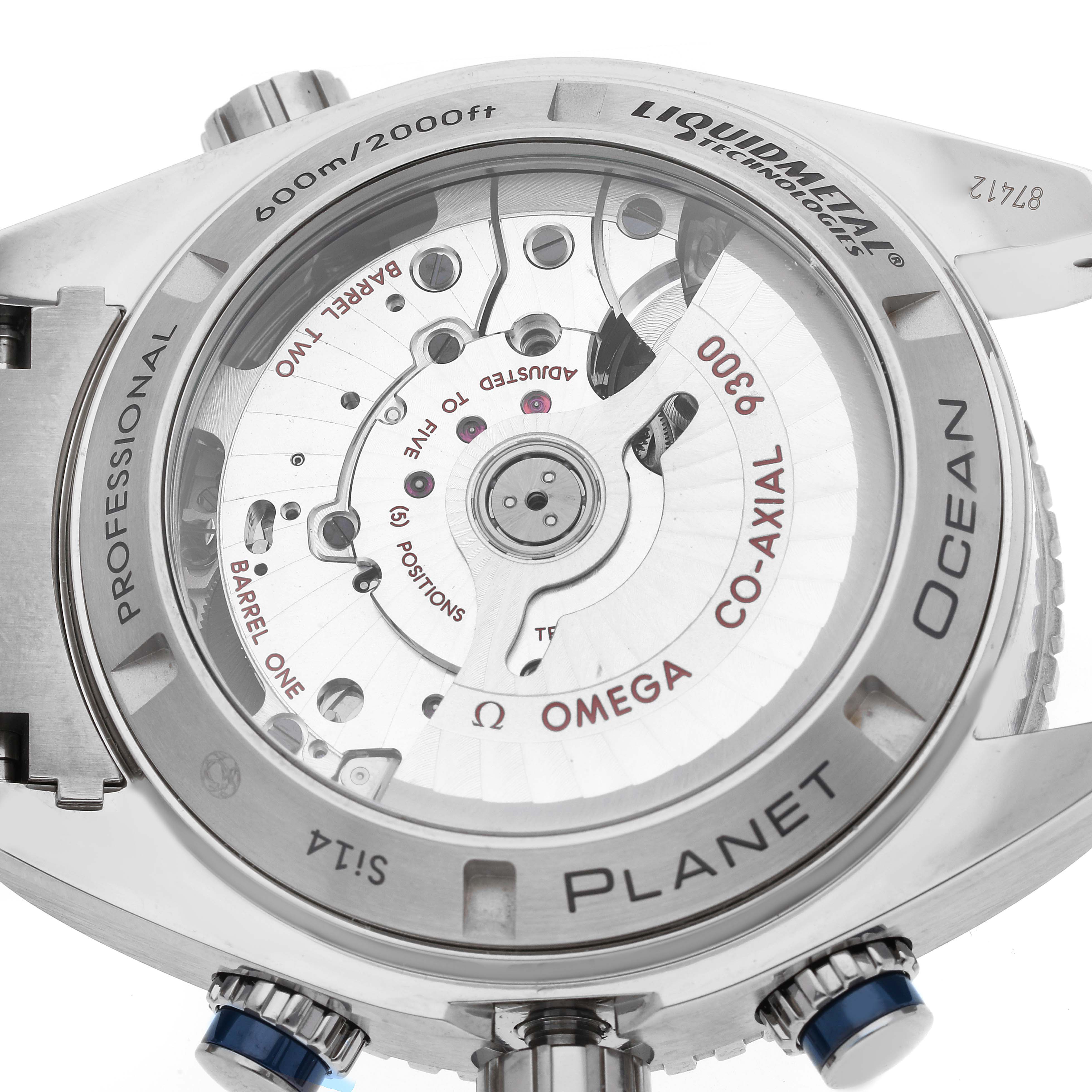 The image shows the case back of an Omega Planet Ocean 232.90.46.51.03.001 Men's Titanium Blue Dial 232.90.46.51.03.001 Men's Titanium Blue Dial watch, highlighting the movement and "Liquidmetal" bezel.
