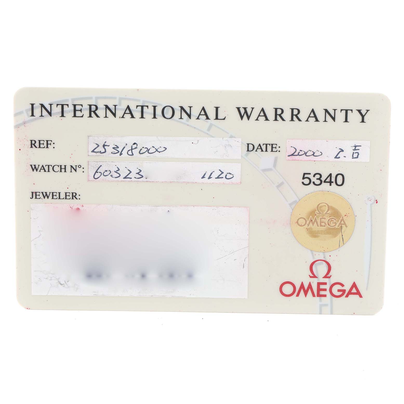 This is a front view of an Omega Seamaster 2531.80.00 Men's Stainless Steel Blue Dial 2531.80.00 Men's Stainless Steel Blue Dial International Warranty card displaying reference numbers and purchase details.