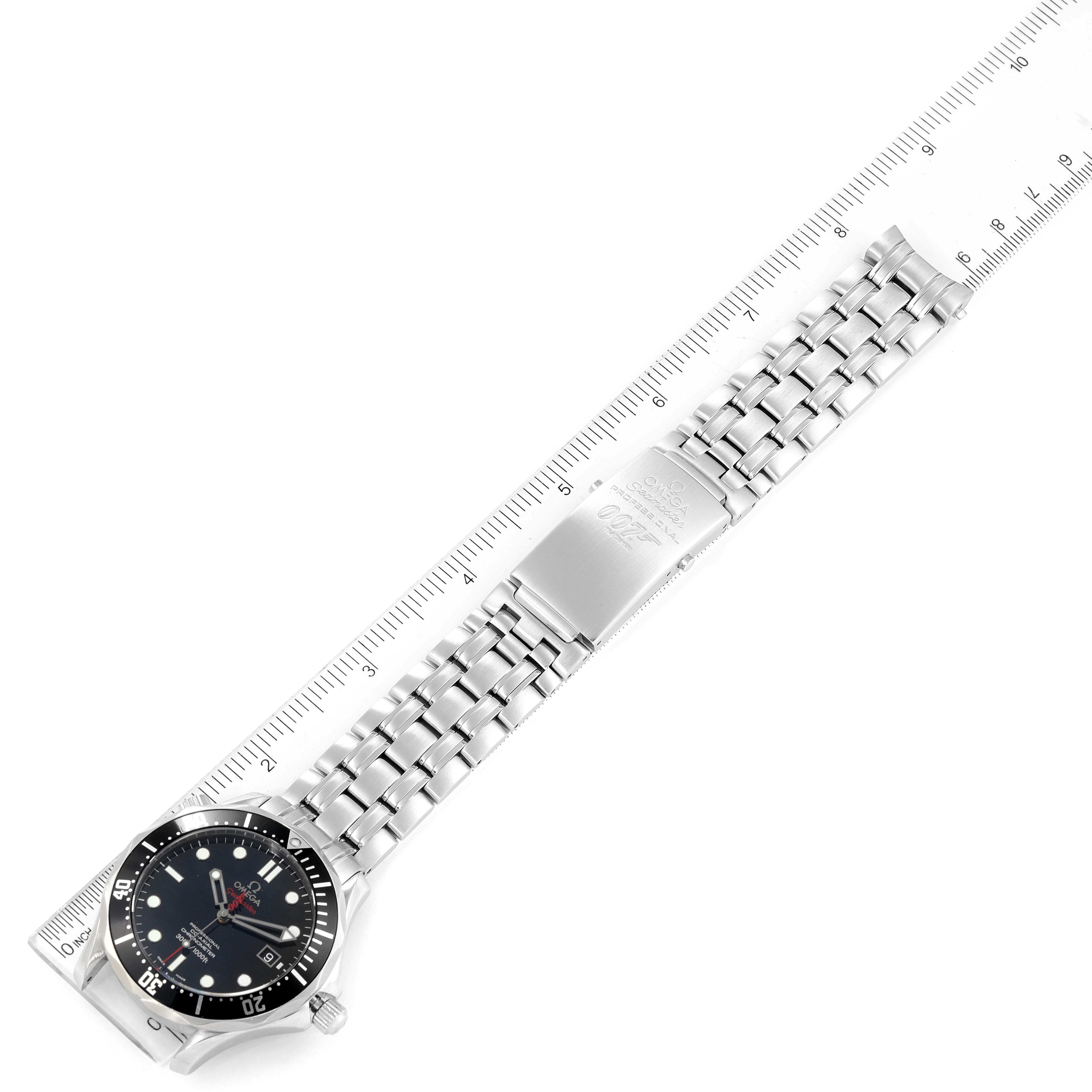 The image shows the Omega Seamaster 212.30.41.20.01.001 Men's Stainless Steel Black Dial 212.30.41.20.01.001 Men's Stainless Steel Black Dial watch laid flat with both the face and the metal bracelet strap visible, alongside a ruler for measurement.