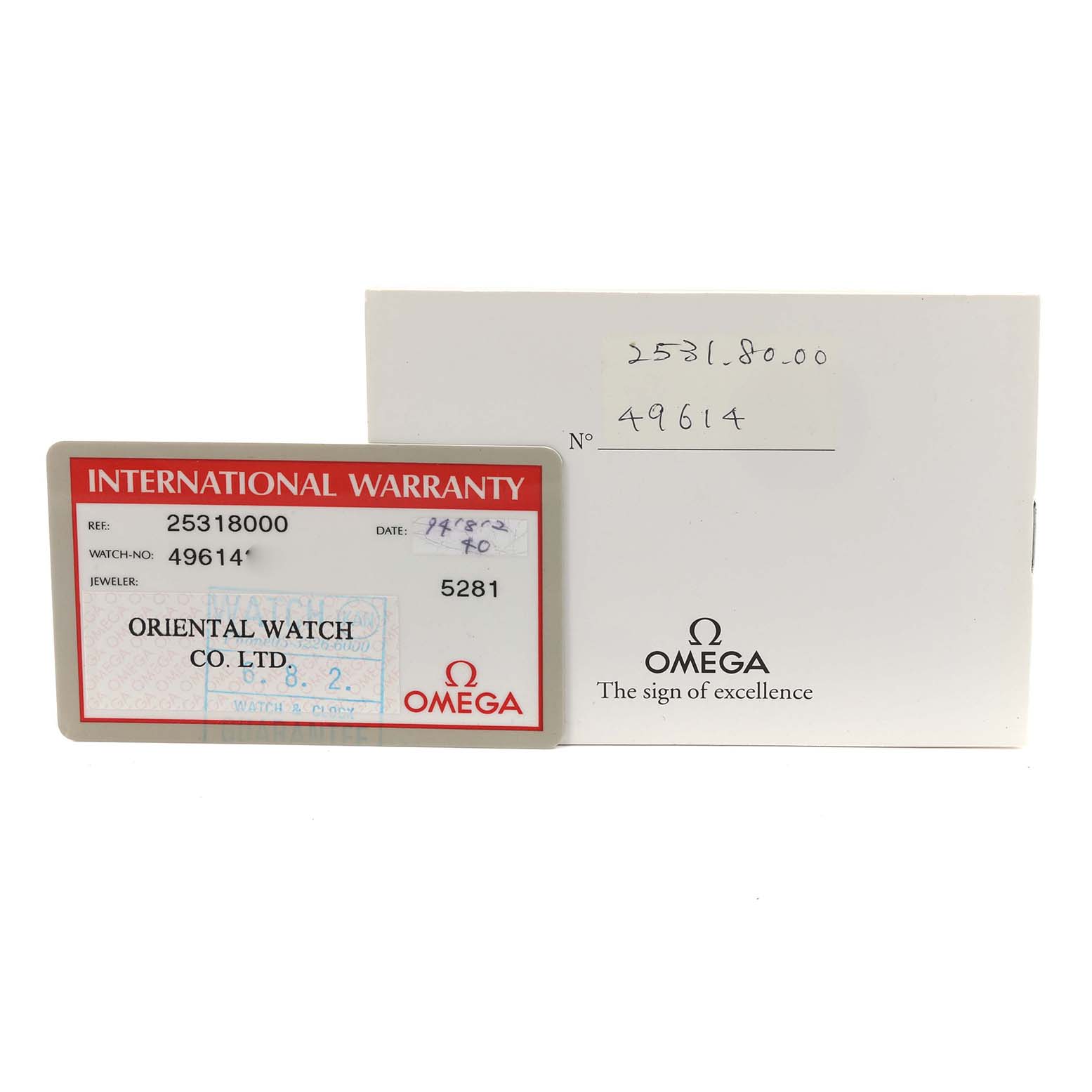 The image shows an Omega Seamaster 2531.80.00 Men
s Stainless Steel Blue Dial 2531.80.00 Men
s Stainless Steel Blue Dial International Warranty card and a white warranty booklet, partially overlapping.