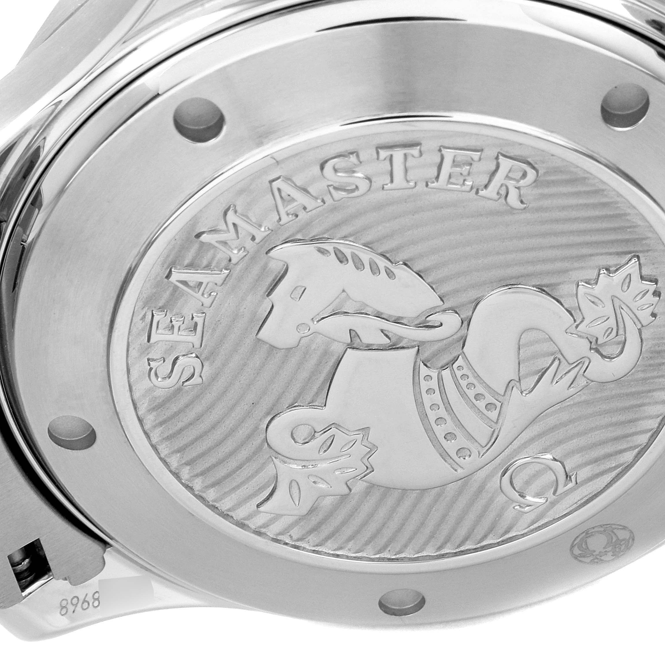 This image shows the engraved case back of an Omega Seamaster 212.30.41.20.03.001 Men's Stainless Steel Blue Dial 212.30.41.20.03.001 Men's Stainless Steel Blue Dial watch, highlighting its intricate design and branding.