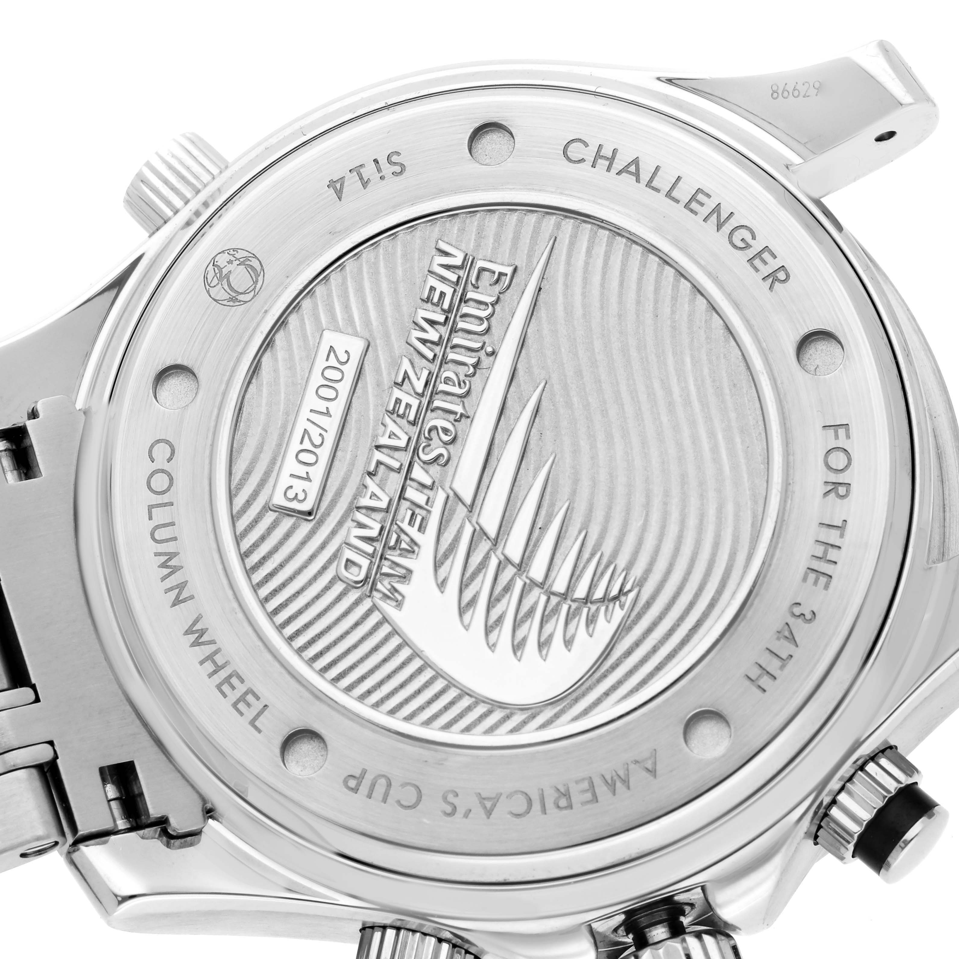 The image shows the back case of an Omega Seamaster 212.32.44.50.01.001 Men's Stainless Steel Black Dial 212.32.44.50.01.001 Men's Stainless Steel Black Dial watch, highlighting engraved details and logos.