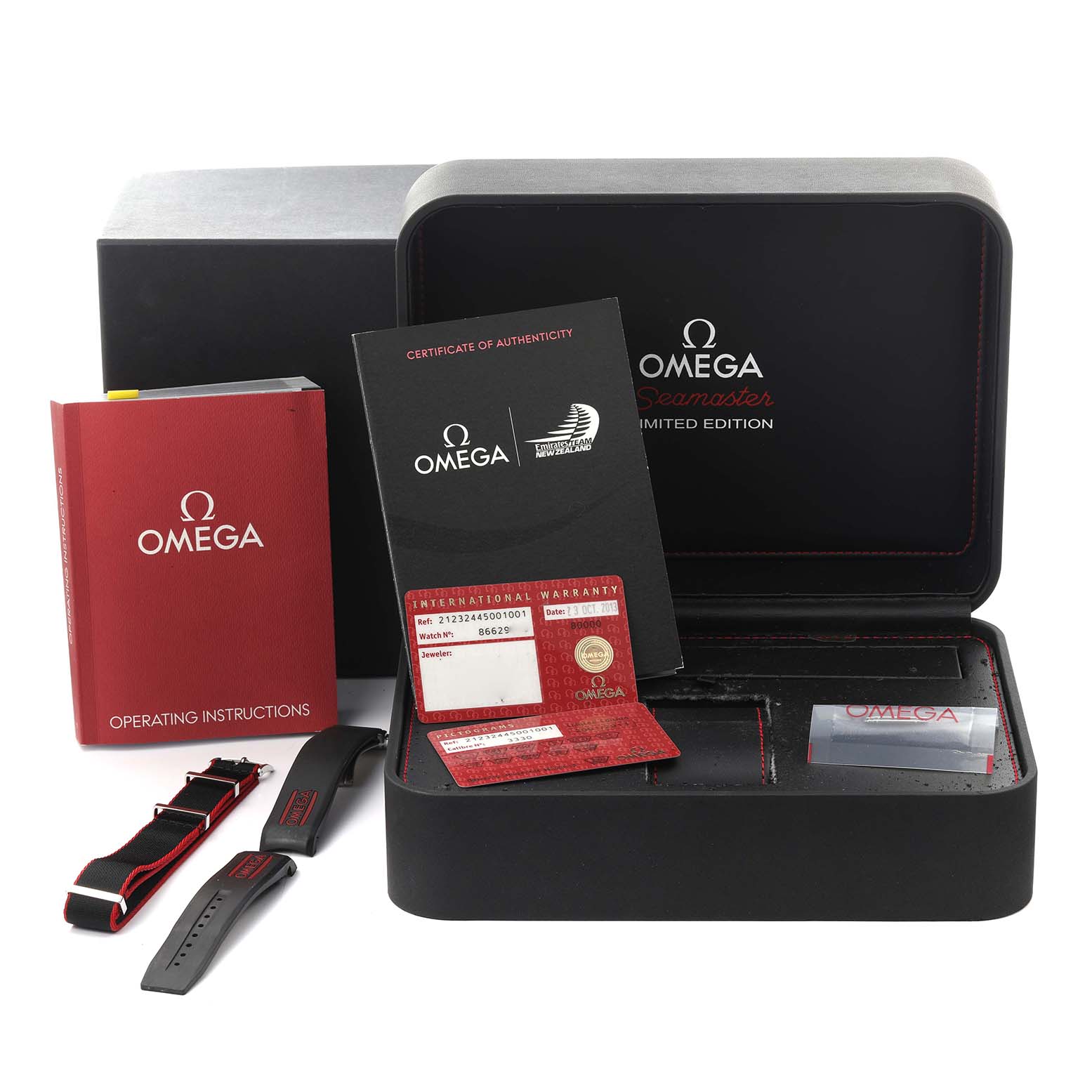 The image shows an Omega Seamaster 212.32.44.50.01.001 Men's Stainless Steel Black Dial 212.32.44.50.01.001 Men's Stainless Steel Black Dial box, warranty cards, operating instructions, and additional straps.