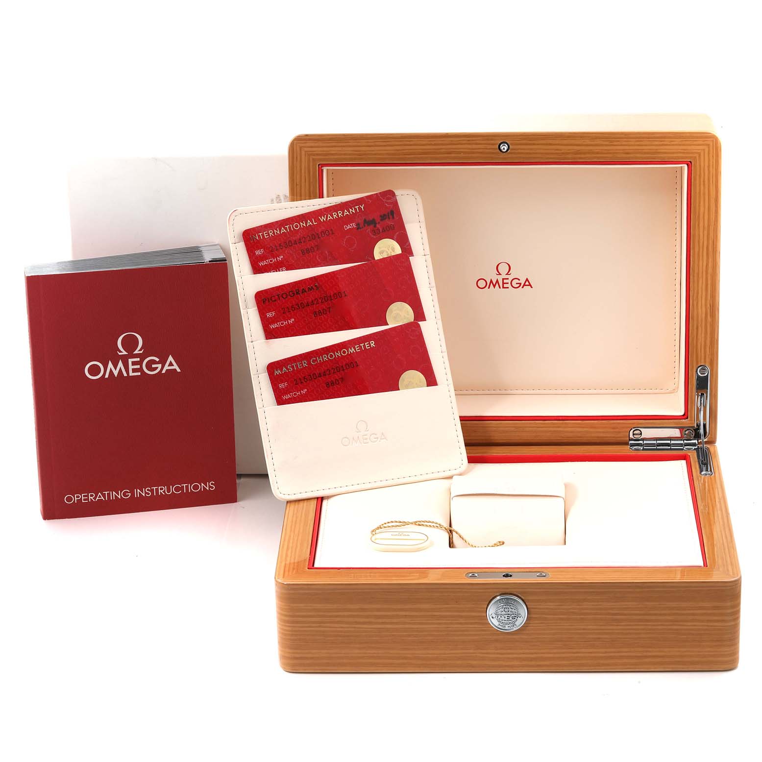 The image shows the Omega Planet Ocean 215.30.44.22.01.001 Men
s Stainless Steel Black Dial 215.30.44.22.01.001 Men
s Stainless Steel Black Dial watch
s box, warranty cards, and operating instructions.