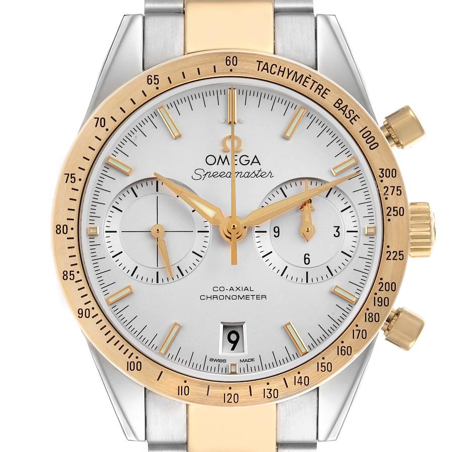 The Omega Seamaster watch is shown from a front angle, highlighting its gold bezel, chronometer, and tachymeter.