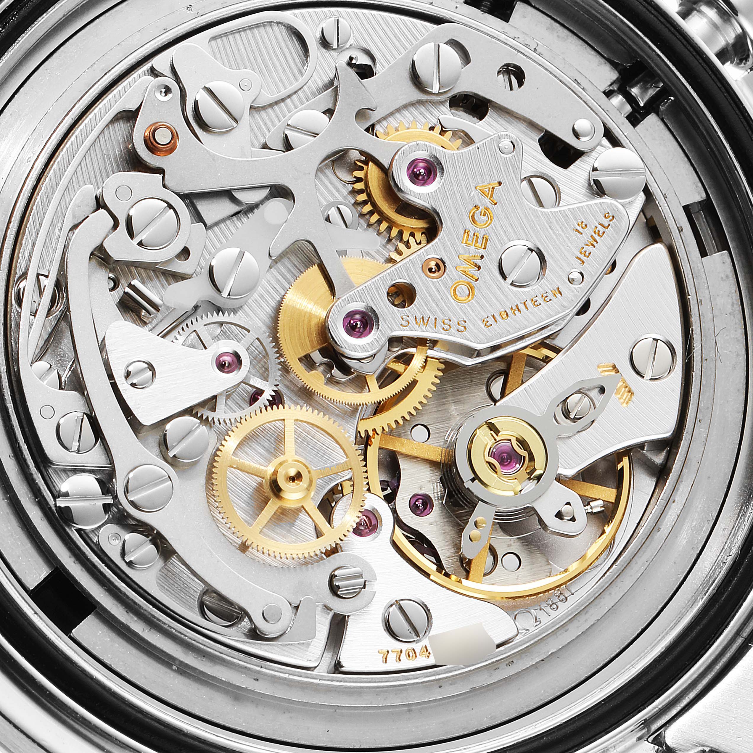 The image shows the intricate mechanical movement of an Omega Speedmaster 3570.50.00 Men
s Stainless Steel Black Dial 3570.50.00 Men
s Stainless Steel Black Dial watch viewed from the back.