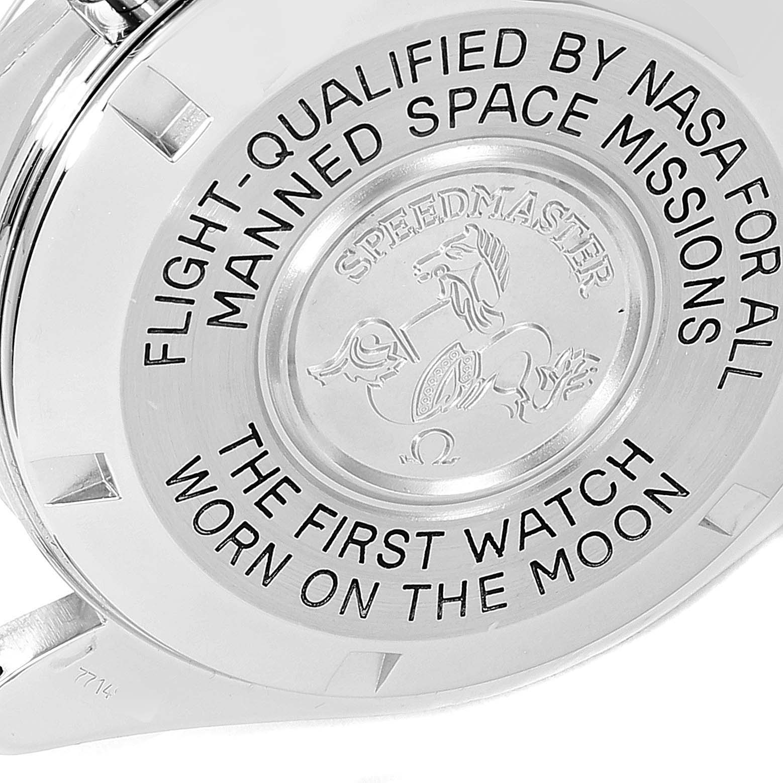 The image shows the case back of an Omega Speedmaster 3570.50.00 Men
s Stainless Steel Black Dial 3570.50.00 Men
s Stainless Steel Black Dial watch, highlighting its NASA qualification and moon landing inscription.