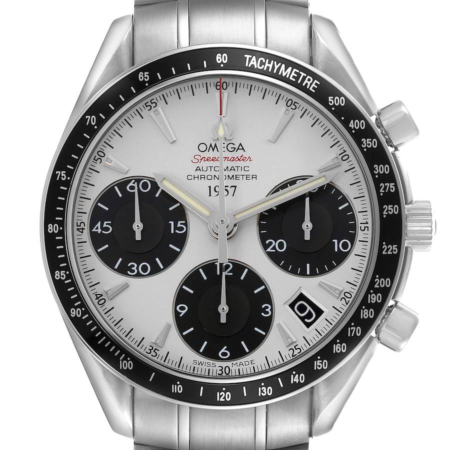 The Omega Speedmaster watch is shown from a front angle, displaying its dial, tachymeter bezel, and chronograph subdials.