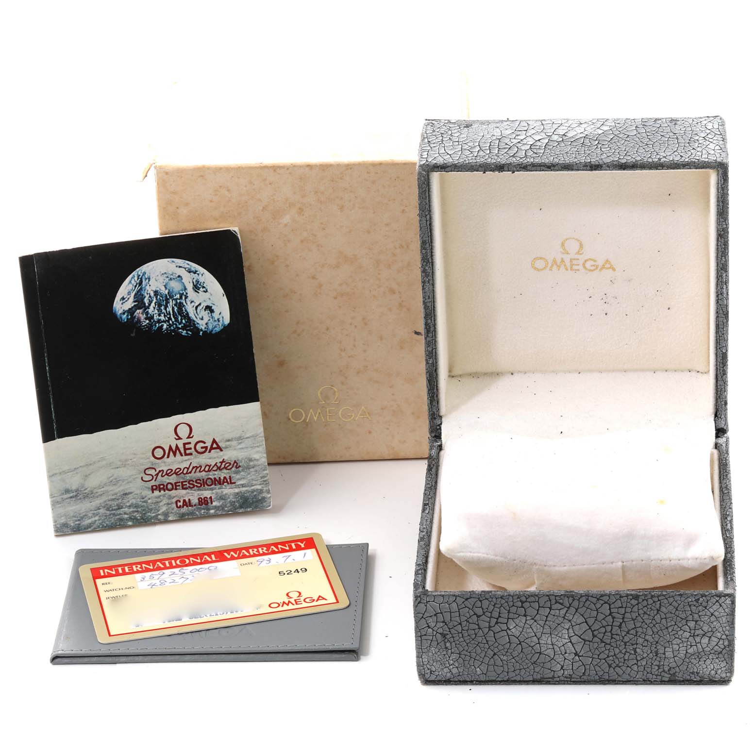 The image shows an Omega Speedmaster 3592.50.00 Men
s Stainless Steel Black Dial 3592.50.00 Men
s Stainless Steel Black Dial watch box, its outer box, a warranty card, and a user manual.