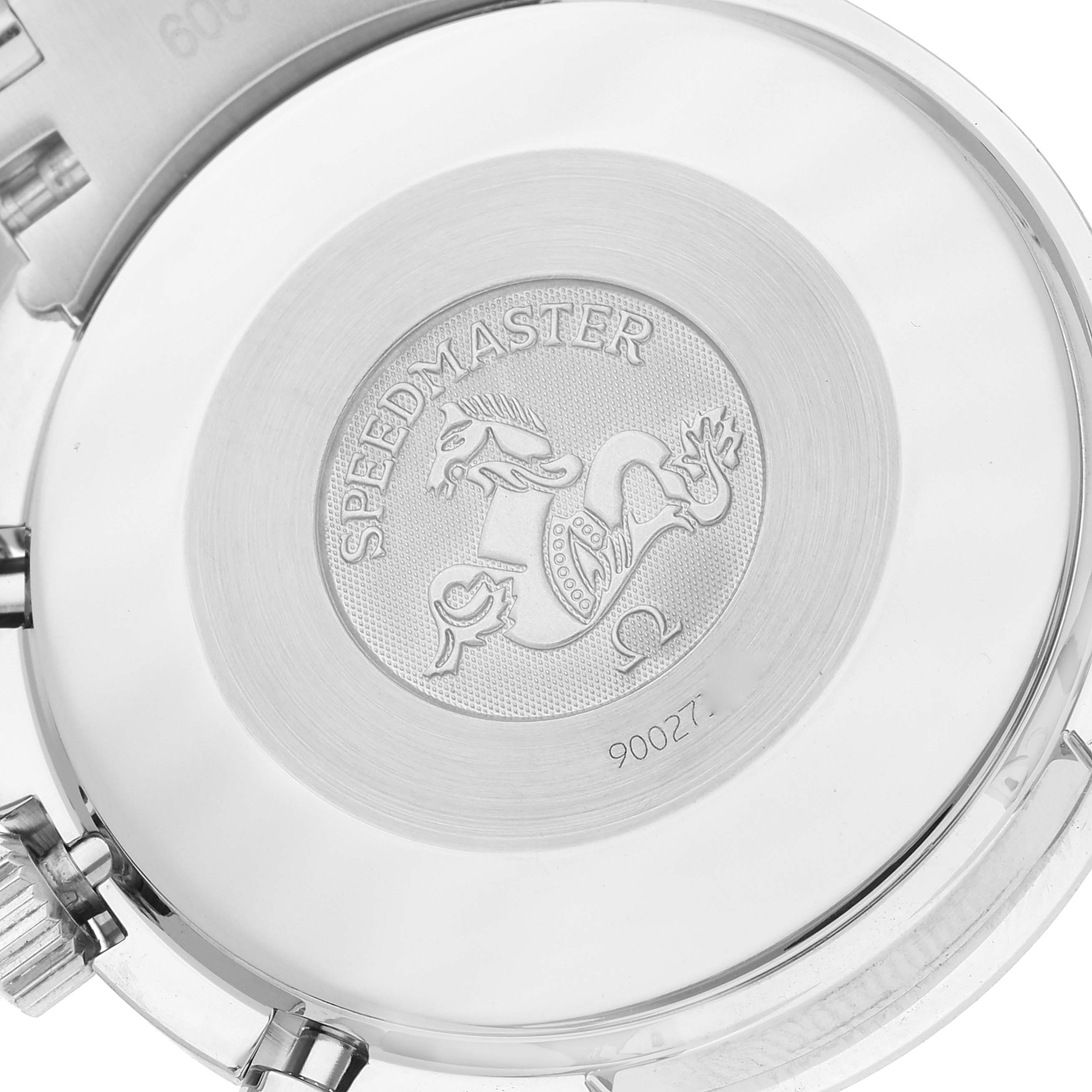 The image shows the back case of an Omega Speedmaster 3515.79.00 Men's Stainless Steel Mother of Pearl Dial 3515.79.00 Men's Stainless Steel Mother of Pearl Dial watch with the engraving and logo visible.