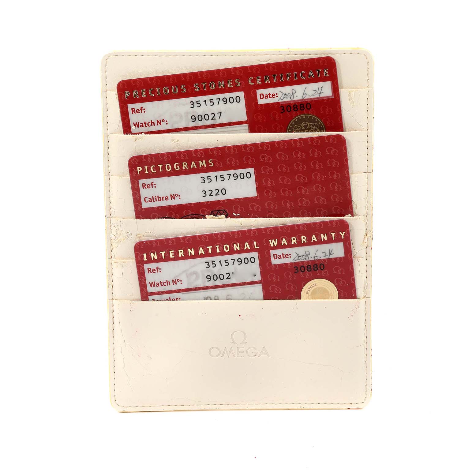 This image shows the warranty cards for an Omega Speedmaster 3515.79.00 Men's Stainless Steel Mother of Pearl Dial 3515.79.00 Men's Stainless Steel Mother of Pearl Dial watch, including a Precious Stones Certificate, Pictograms, and an International Warranty.