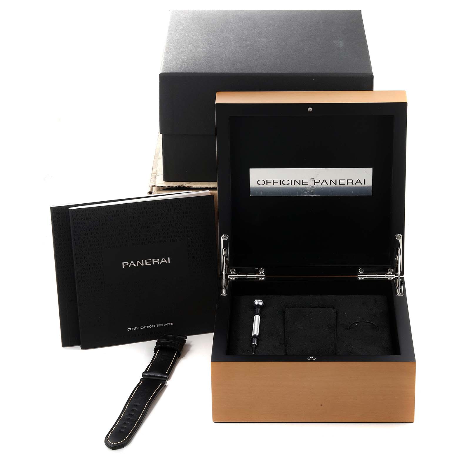 The image shows the packaging and accessories for a Panerai Luminor PAM00560 Men
s Stainless Steel Black Dial PAM00560 Men
s Stainless Steel Black Dial watch, including the presentation box, strap, and booklets.