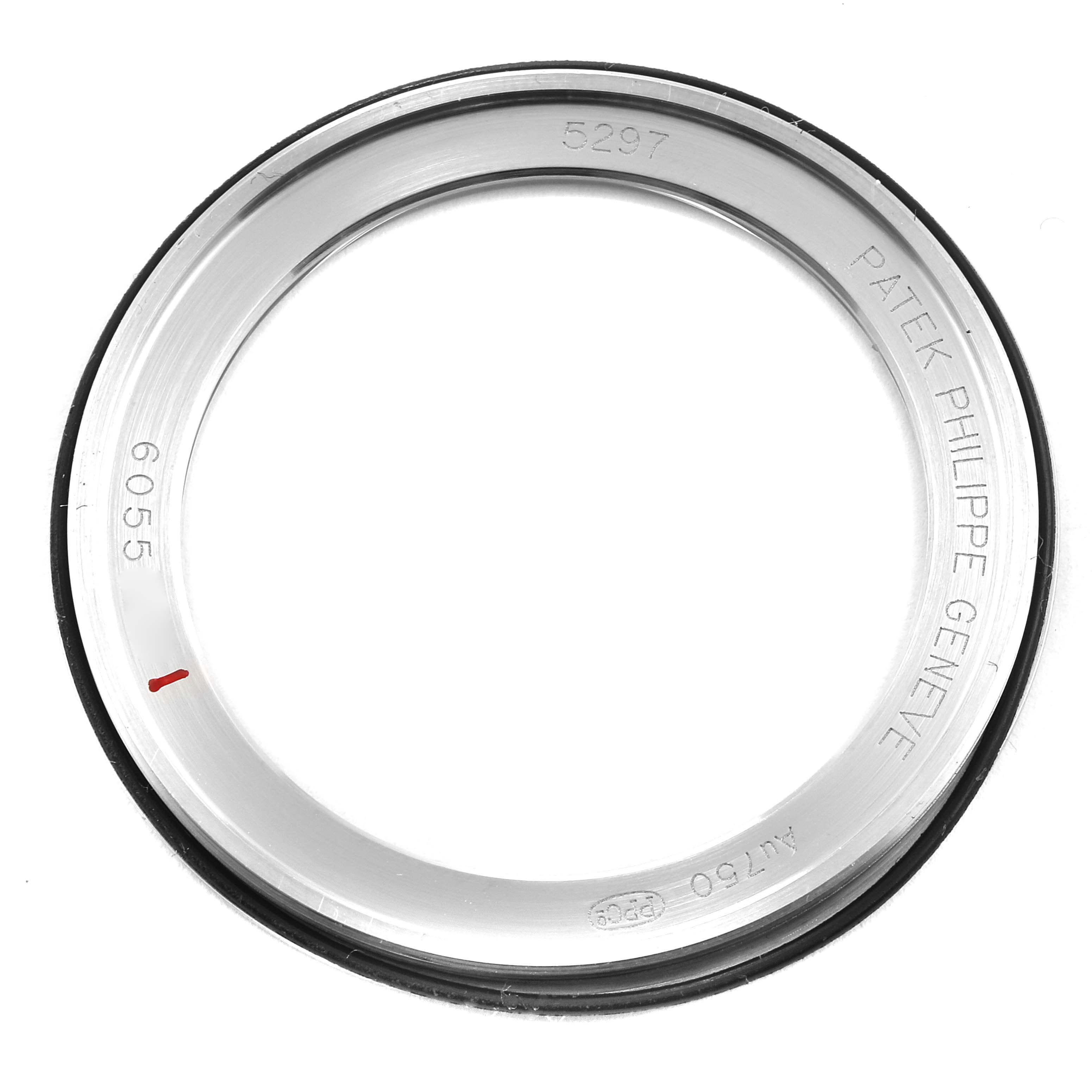 This image shows the bezel of the Patek Philippe Calatrava 5297G Men's White Gold Black Dial 5297G Men's White Gold Black Dial watch, with an overhead view displaying its engravings.