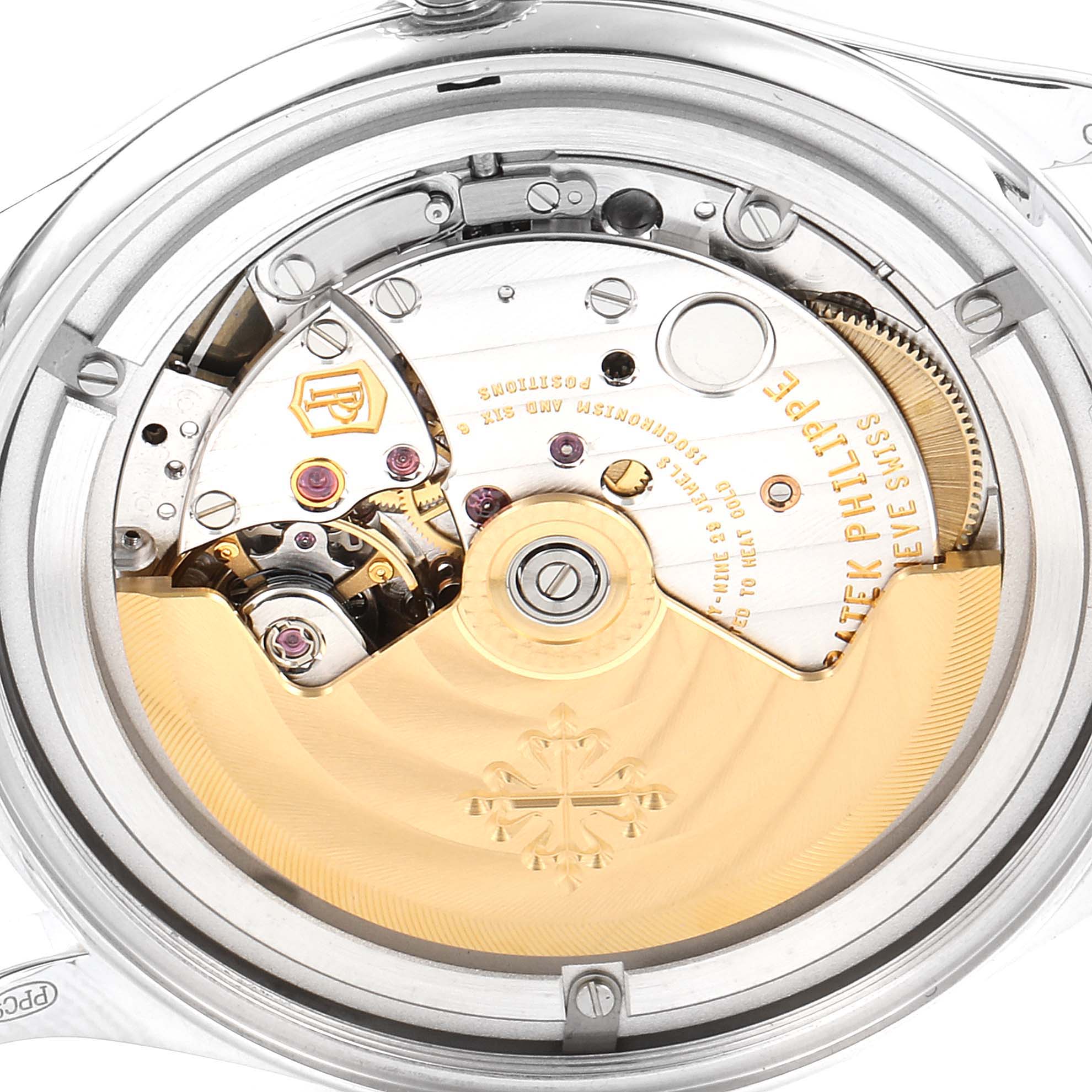 This image shows a close-up of the Patek Philippe Calatrava 5297G Men's White Gold Black Dial 5297G Men's White Gold Black Dial's watch movement and rotor from the back.