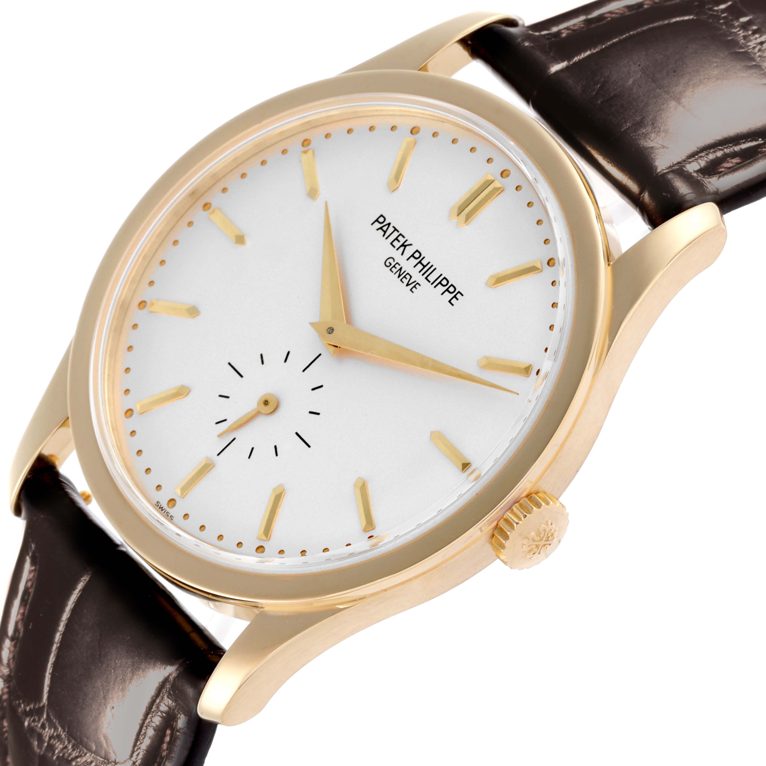 The Patek Philippe Calatrava 5196J Men's Yellow Gold Silver Dial 5196J Men's Yellow Gold Silver Dial watch is shown at an angled side view, highlighting the dial, crown, and leather strap.