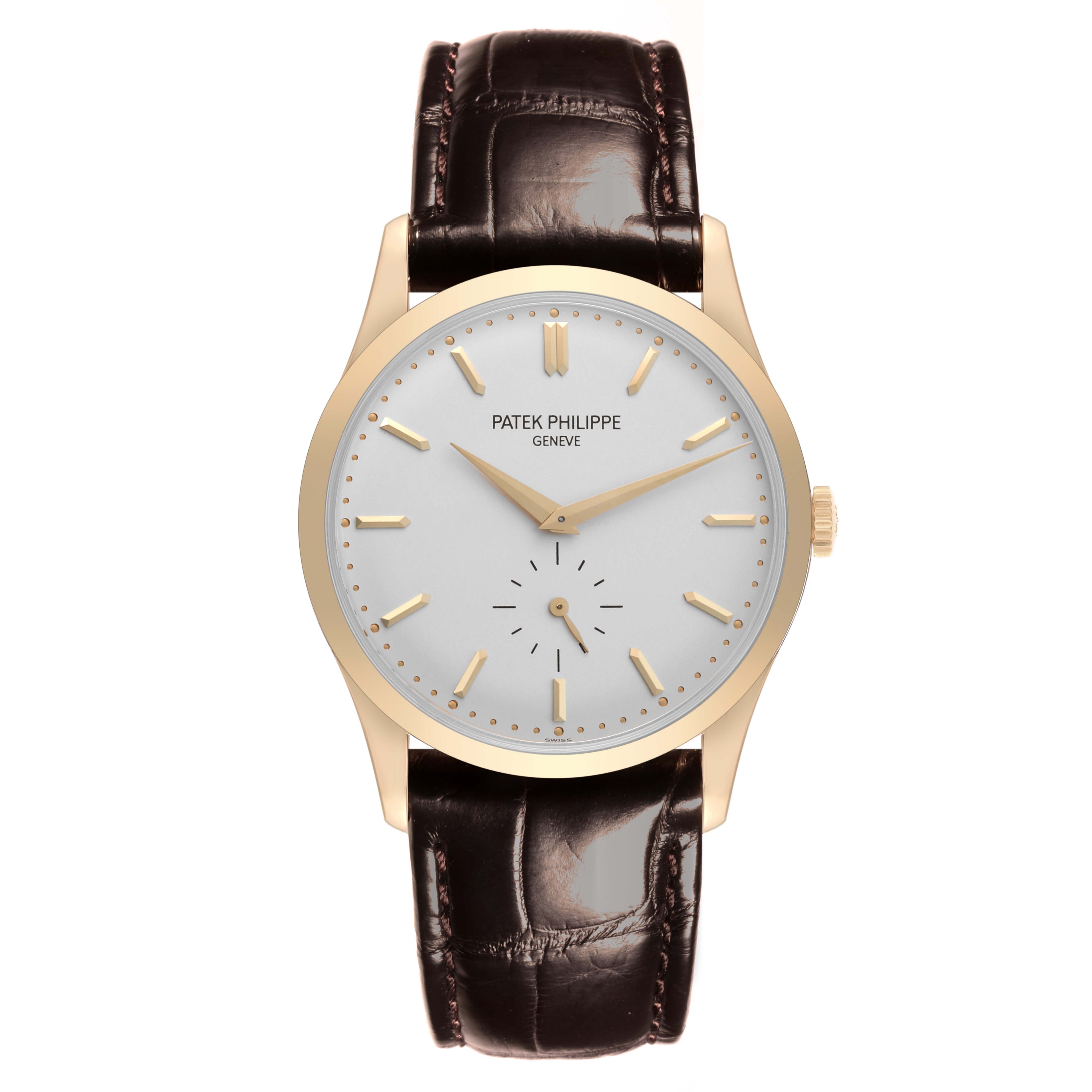 The Patek Philippe Calatrava 5196J Men's Yellow Gold Silver Dial 5196J Men's Yellow Gold Silver Dial watch is shown from a front angle, displaying the dial, hands, and leather strap.