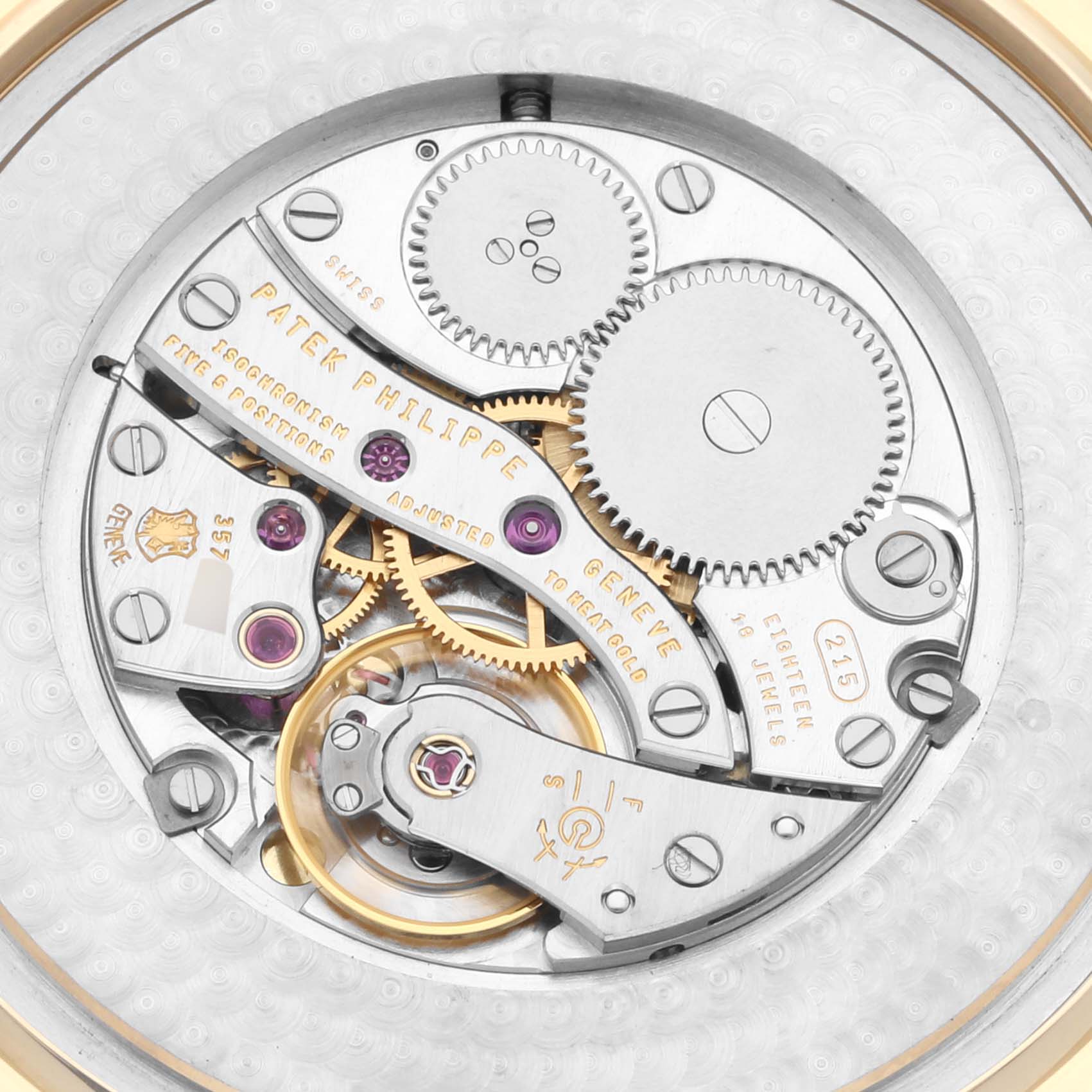 This image shows a close-up of the movement and internal mechanics of the Patek Philippe Calatrava 5196J Men's Yellow Gold Silver Dial 5196J Men's Yellow Gold Silver Dial watch.