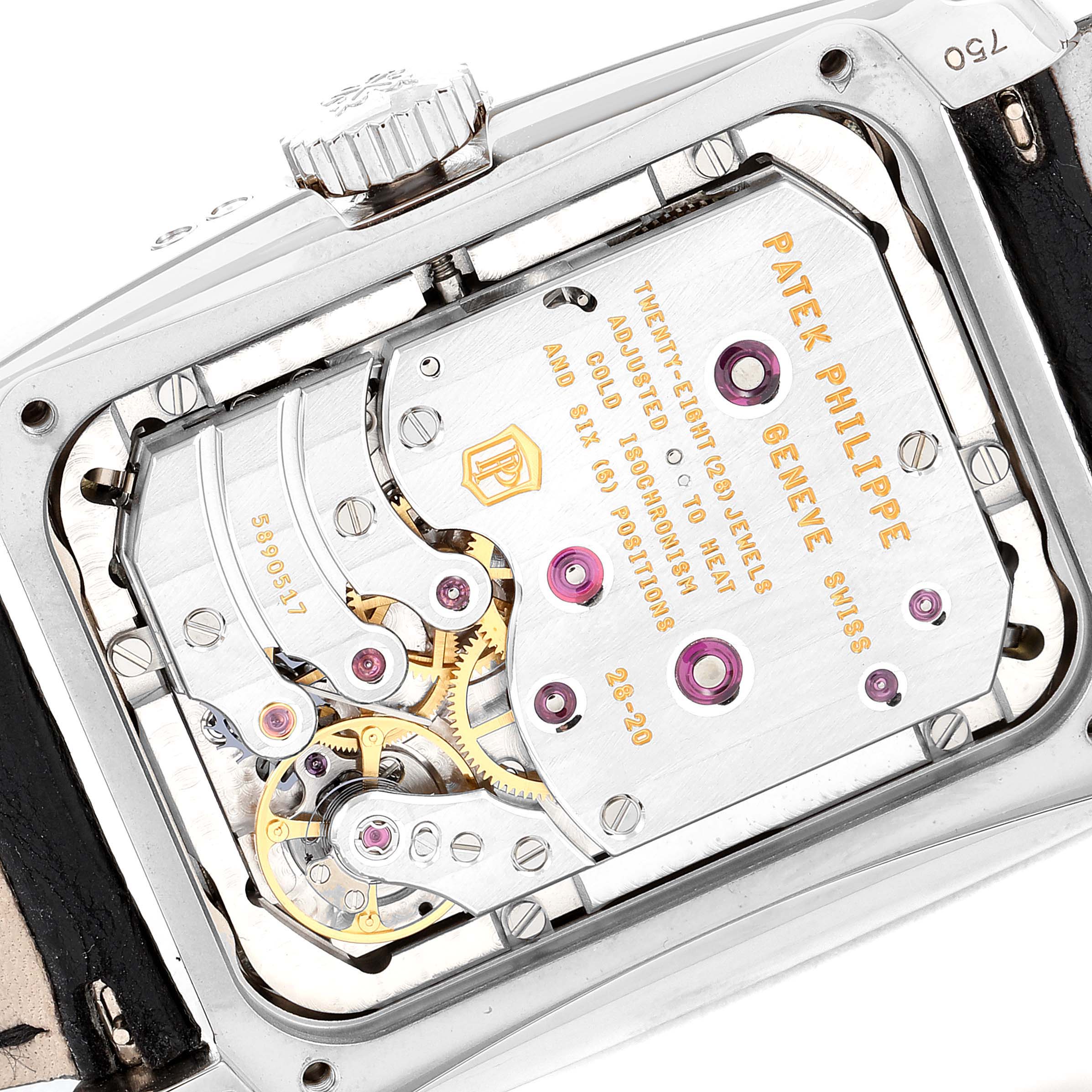 The image shows the back of a Patek Philippe Gondolo 5200G-010 Men
s White Gold Blue Dial 5200G-010 Men
s White Gold Blue Dial watch, revealing its intricate movement and internal components.