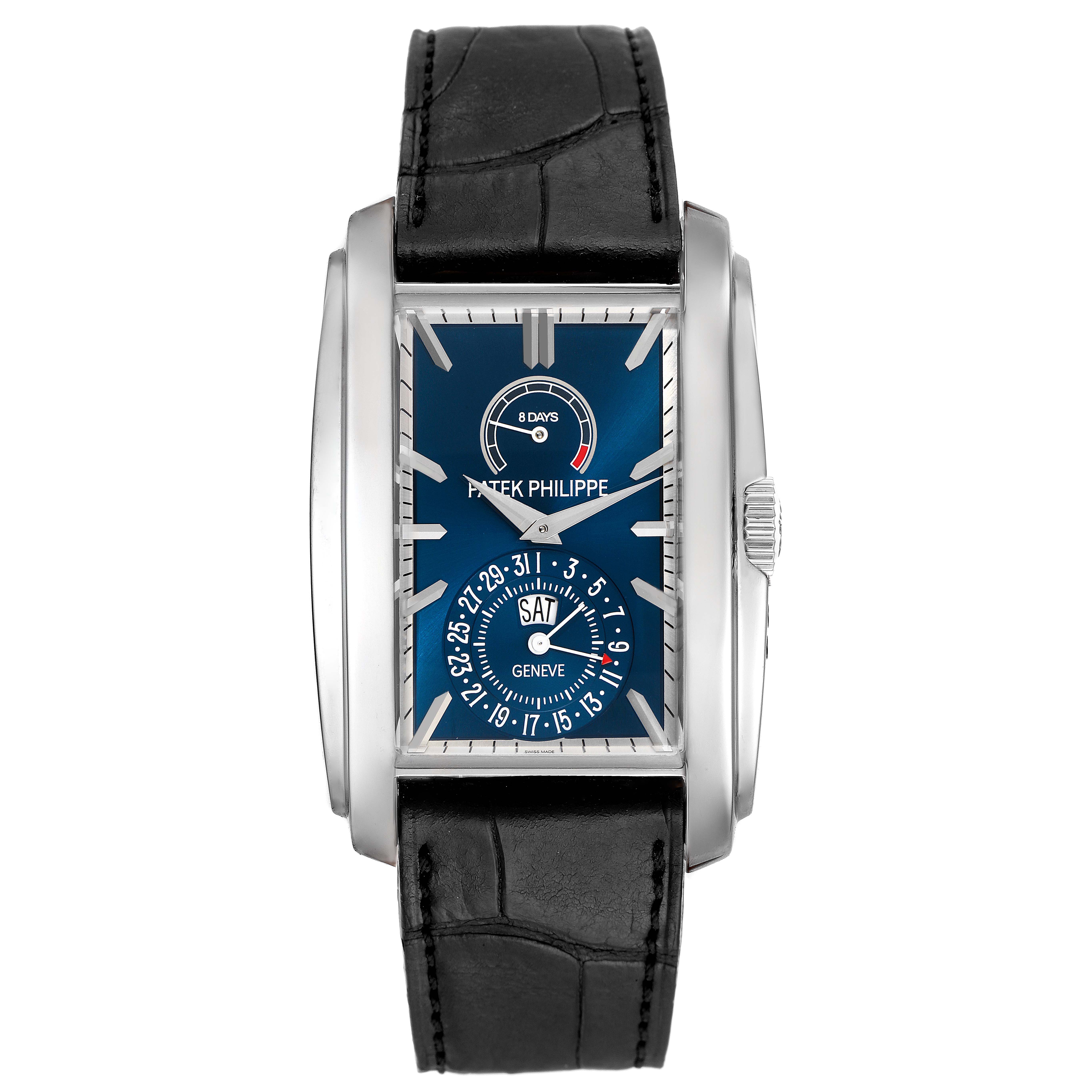 The image shows a Patek Philippe Gondolo 5200G-010 Men
s White Gold Blue Dial 5200G-010 Men
s White Gold Blue Dial model watch from a top-down angle, highlighting its face and leather strap.