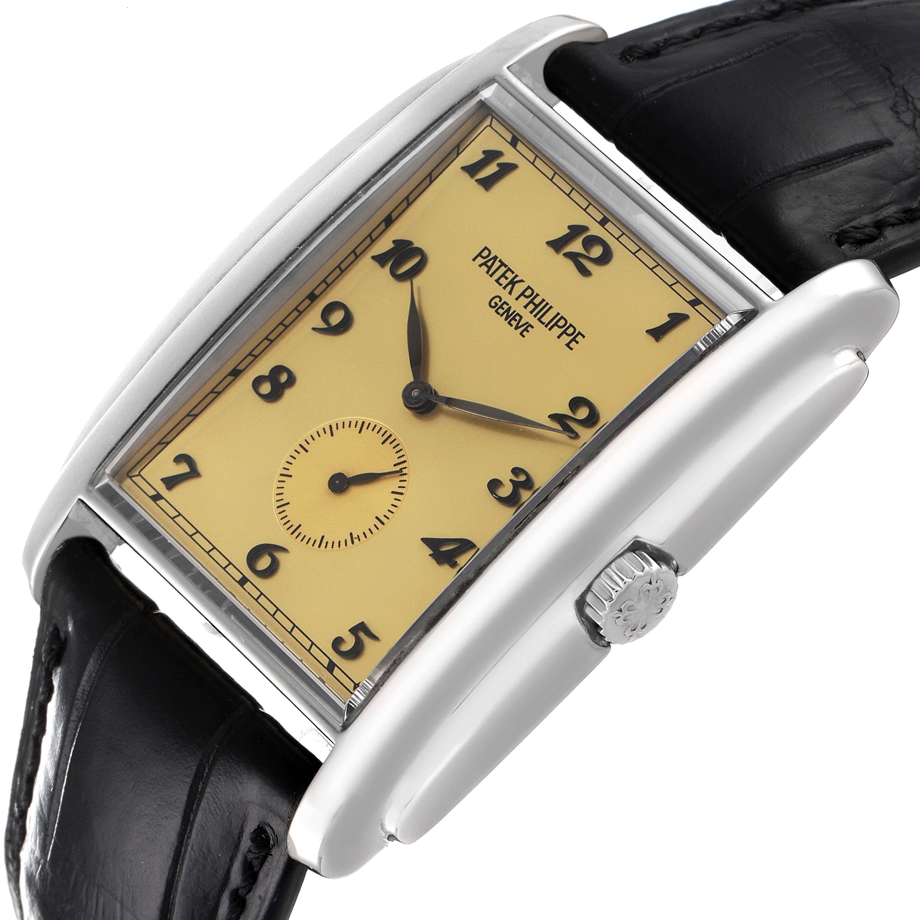 The image shows a close-up of the face and crown of the Patek Philippe Gondolo 5124G Men's White Gold Champagne Dial 5124G Men's White Gold Champagne Dial watch at an angle.