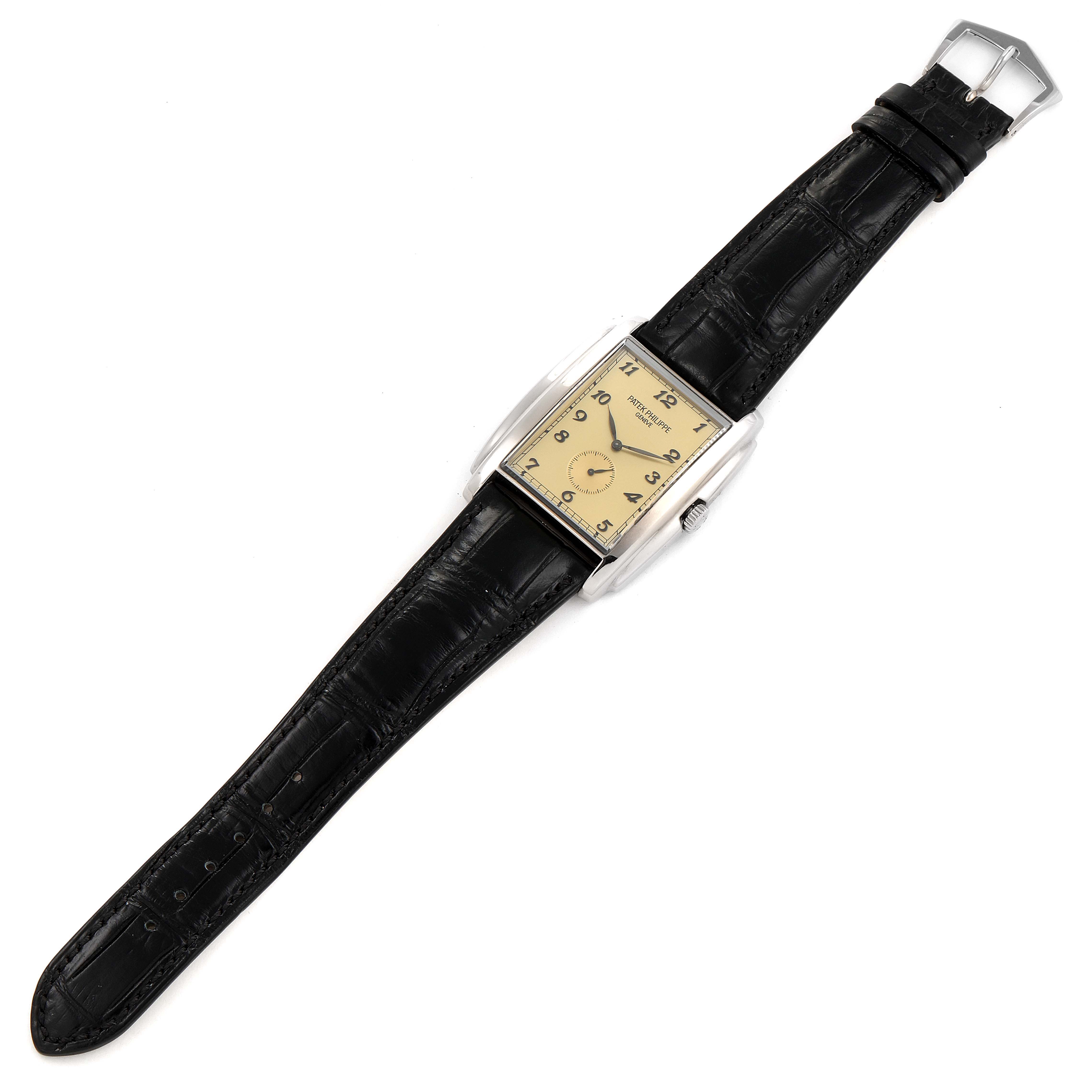 The image shows a top-down view of a Patek Philippe Gondolo 5124G Men's White Gold Champagne Dial 5124G Men's White Gold Champagne Dial watch with a rectangular dial and black leather strap.