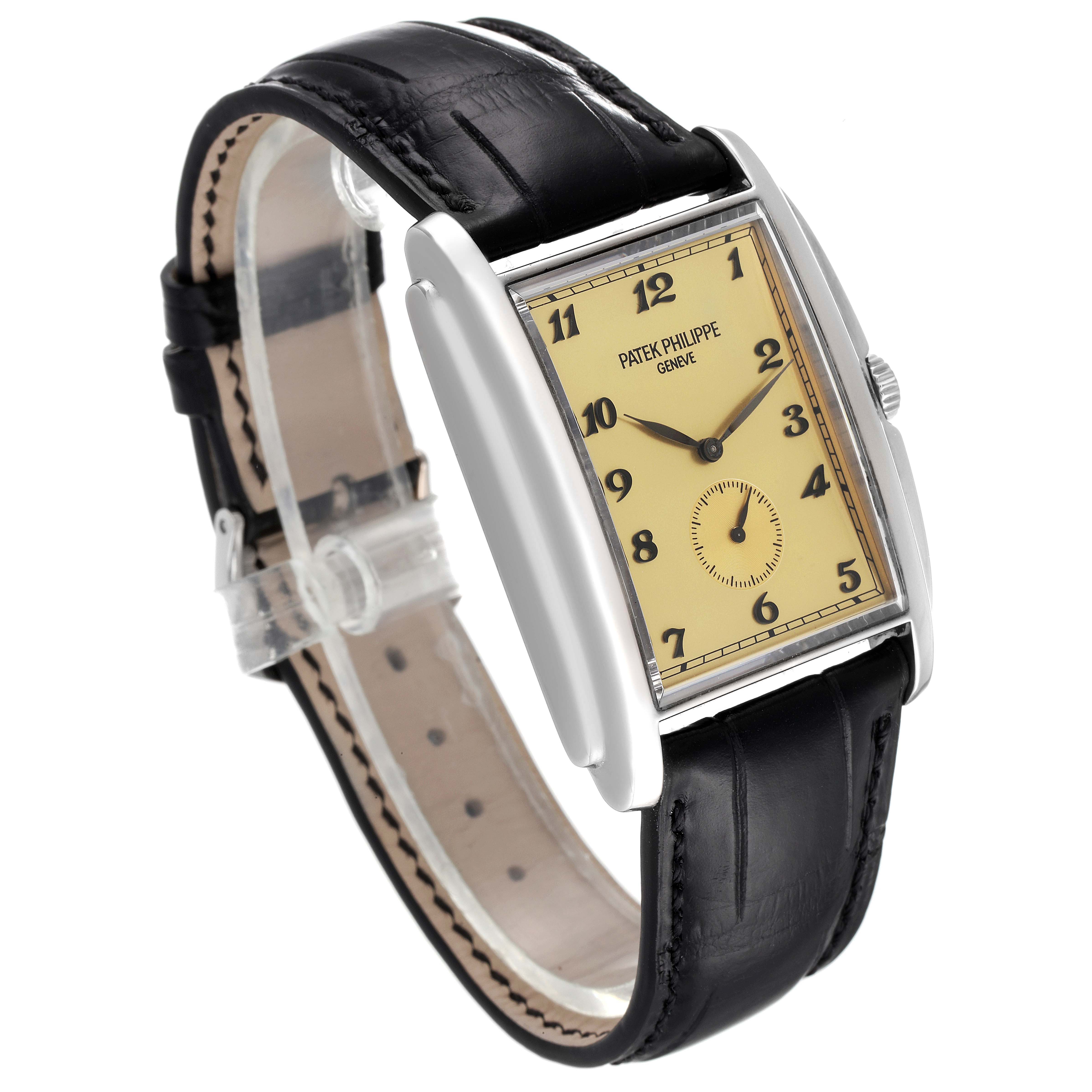 The image shows a Patek Philippe Gondolo 5124G Men's White Gold Champagne Dial 5124G Men's White Gold Champagne Dial watch at a three-quarter angle, highlighting its dial, case, crown, and black leather strap.