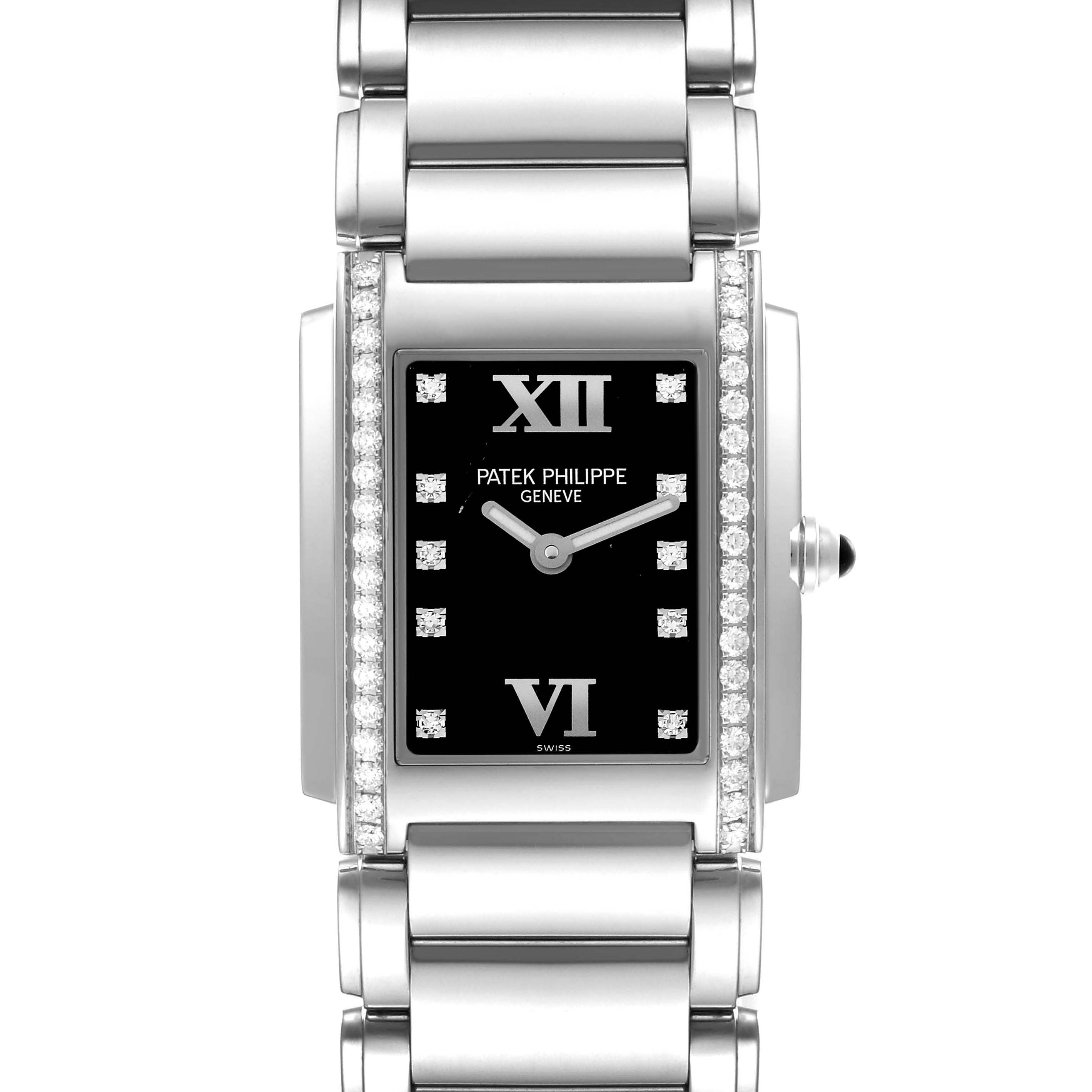 The image shows a frontal view of the Patek Philippe Twenty-4 4910/10A-001 Women's Stainless Steel Black Dial 4910/10A-001 Women's Stainless Steel Black Dial, highlighting the rectangular face and diamond accents on the sides.