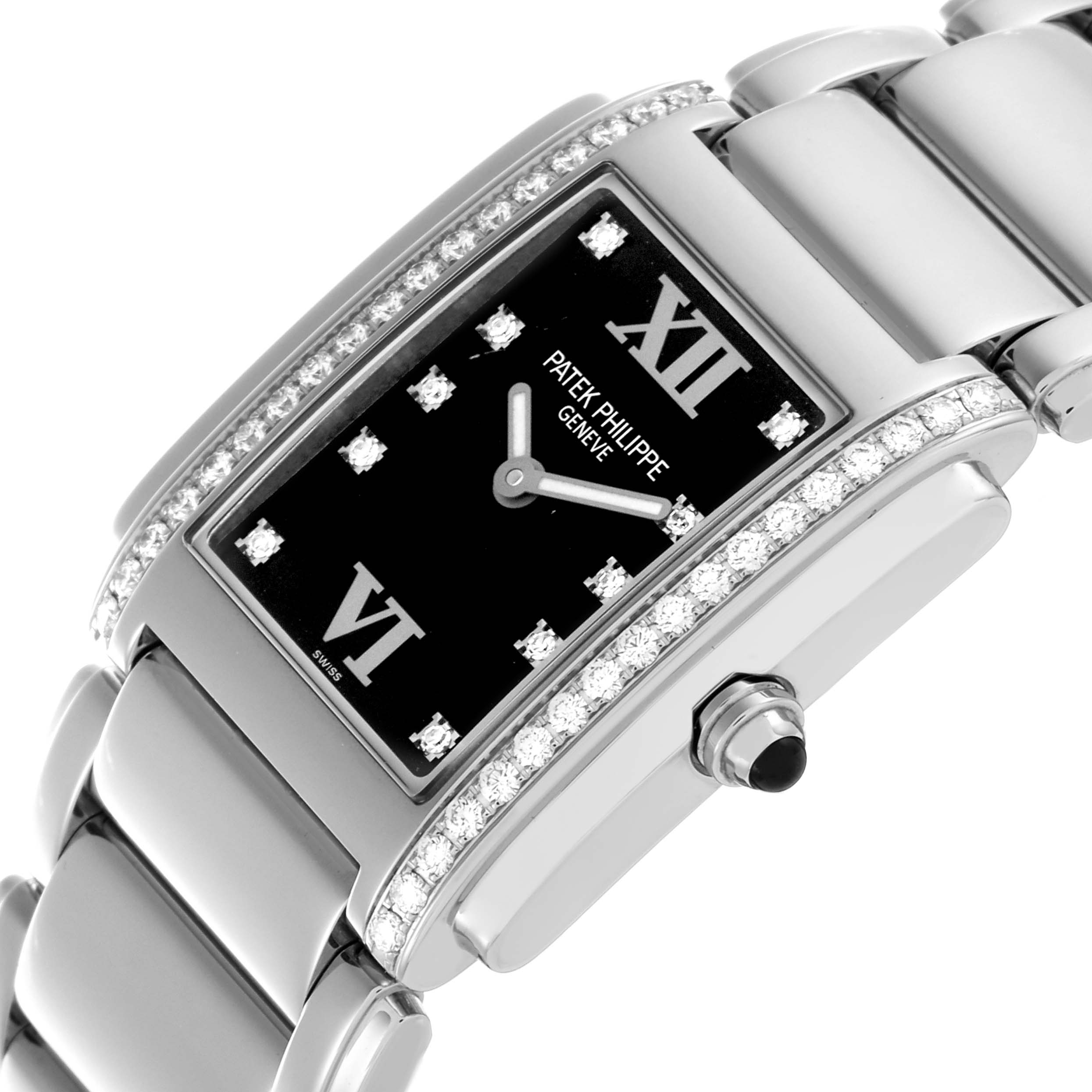 The image shows a close-up angle of the Patek Philippe Twenty-4 4910/10A-001 Women's Stainless Steel Black Dial 4910/10A-001 Women's Stainless Steel Black Dial watch, highlighting the diamond-studded bezel, black dial, and bracelet.